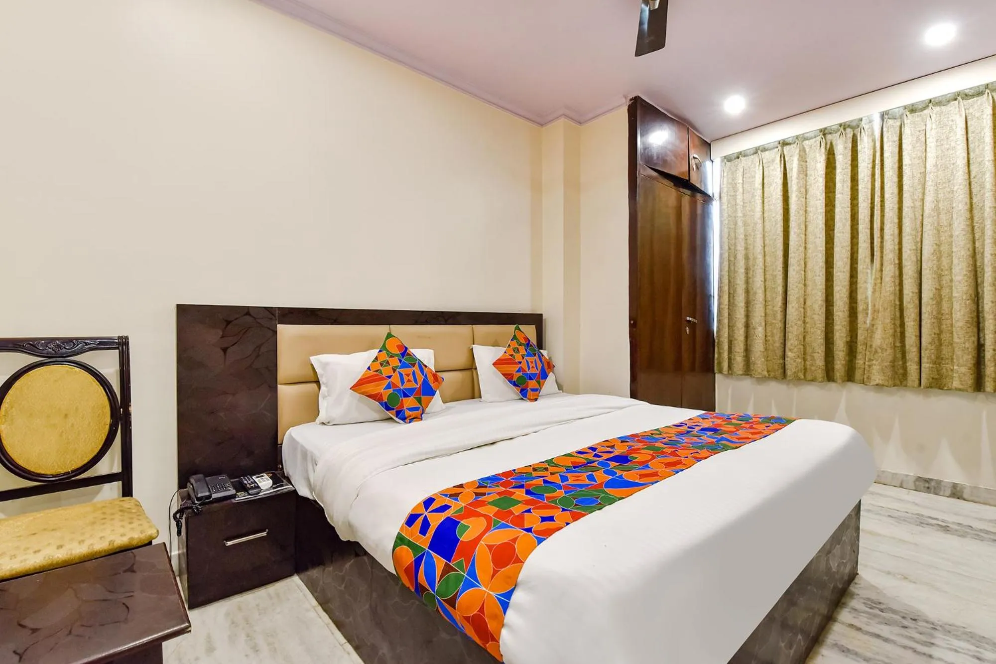 Bed in FabHotel Golden Leaf