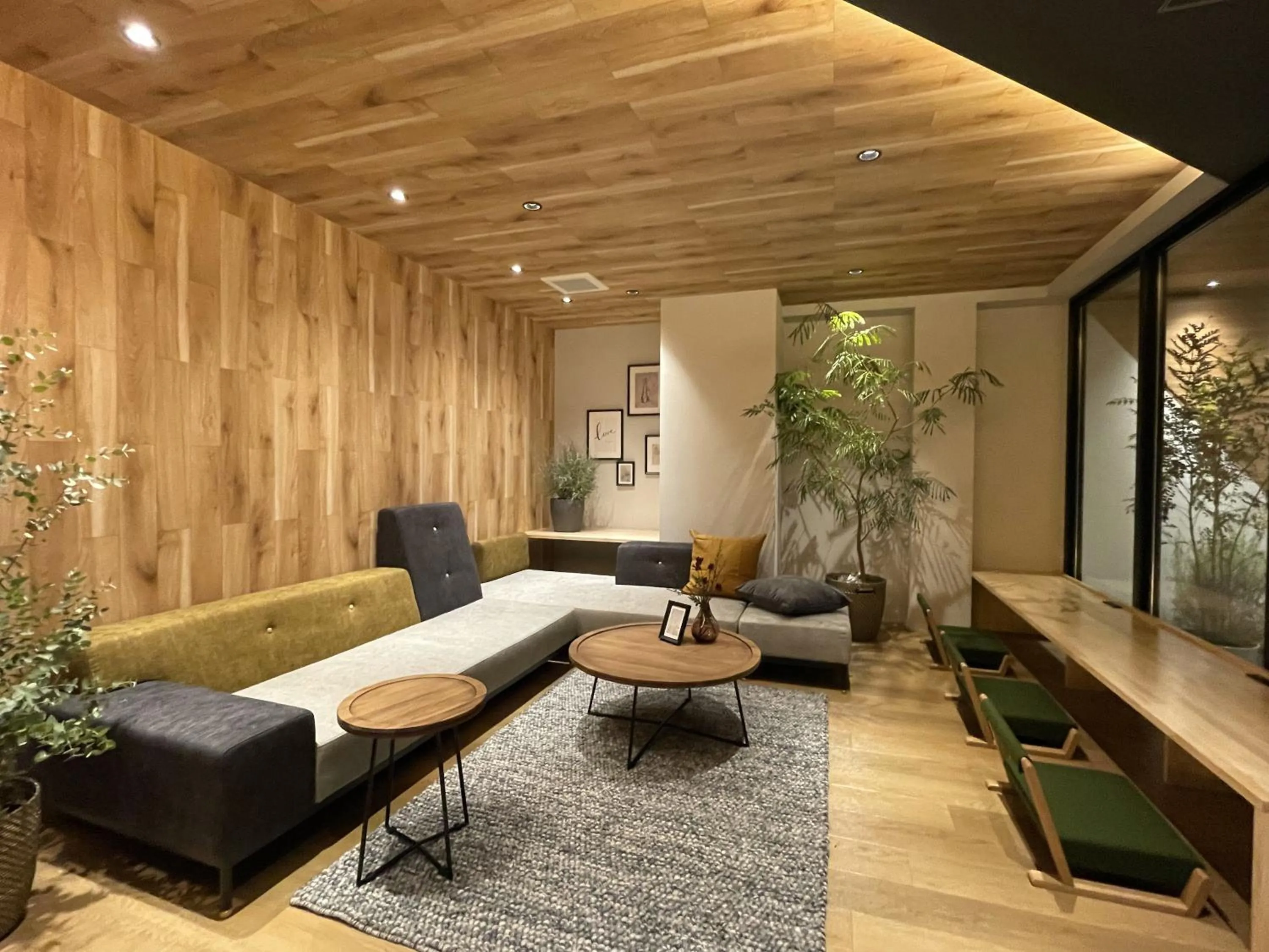 Communal lounge/ TV room in R Hotel Namba