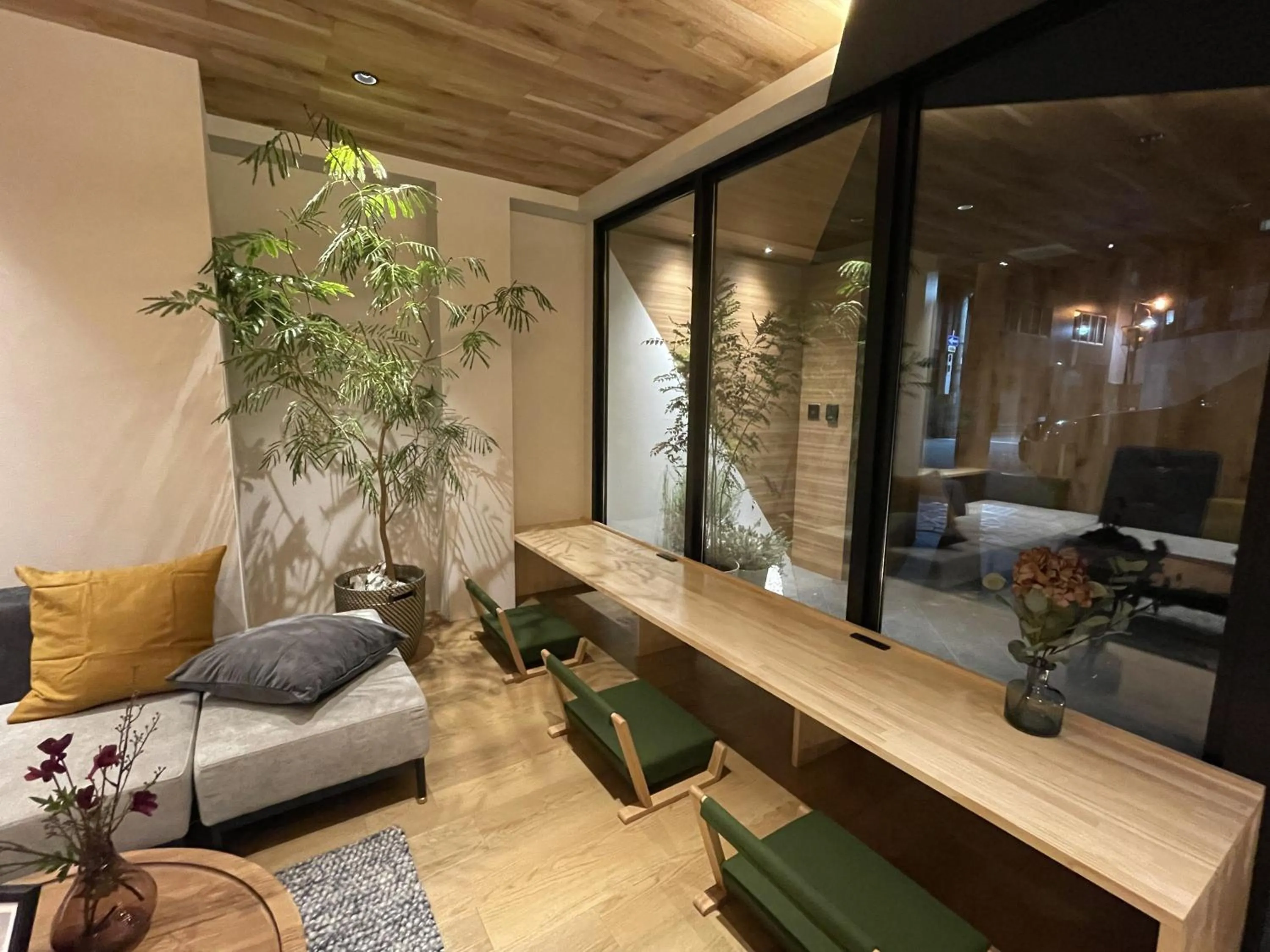 Communal lounge/ TV room in R Hotel Namba