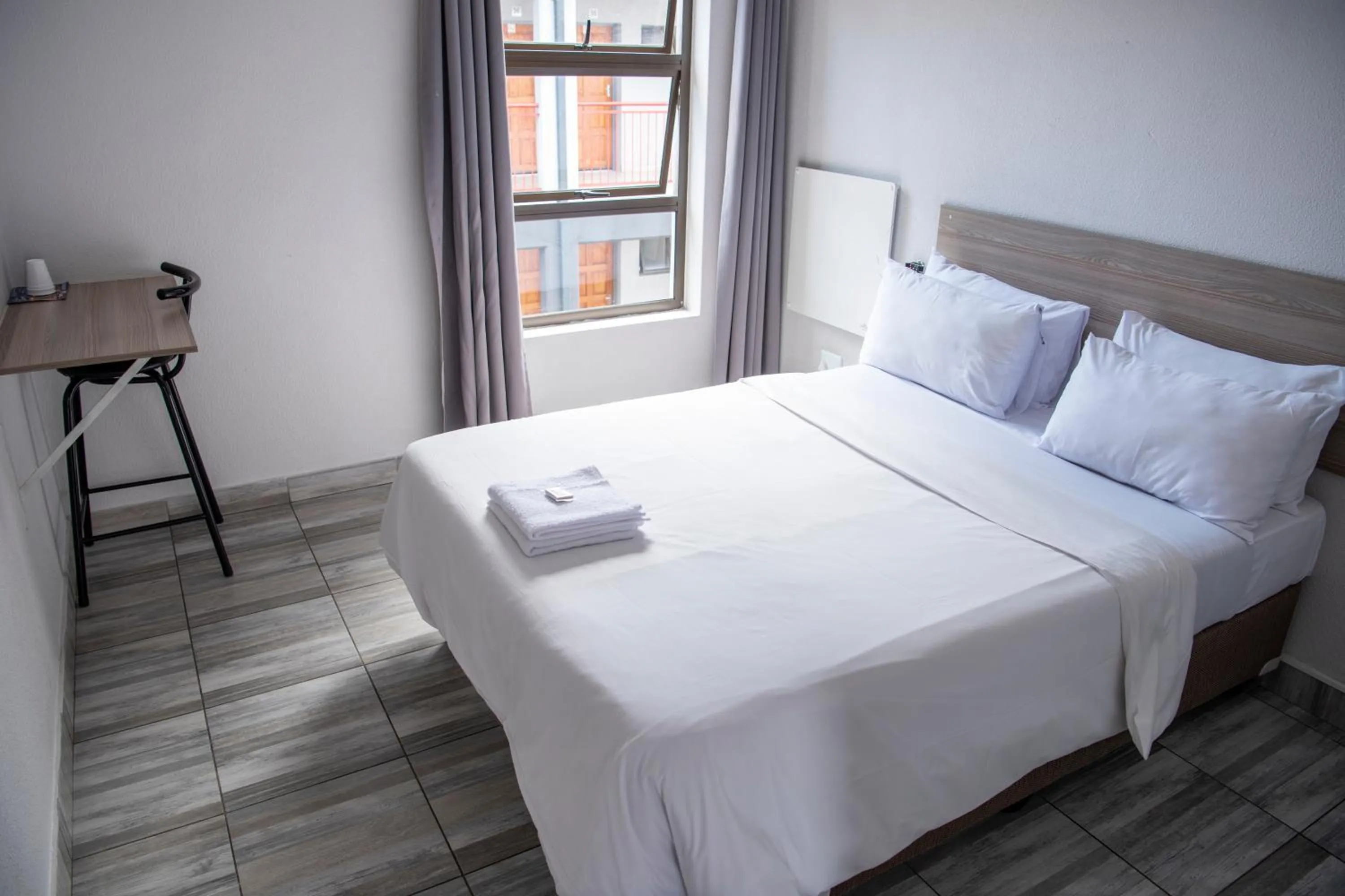 Bed in Ecomotel O.R.Tambo