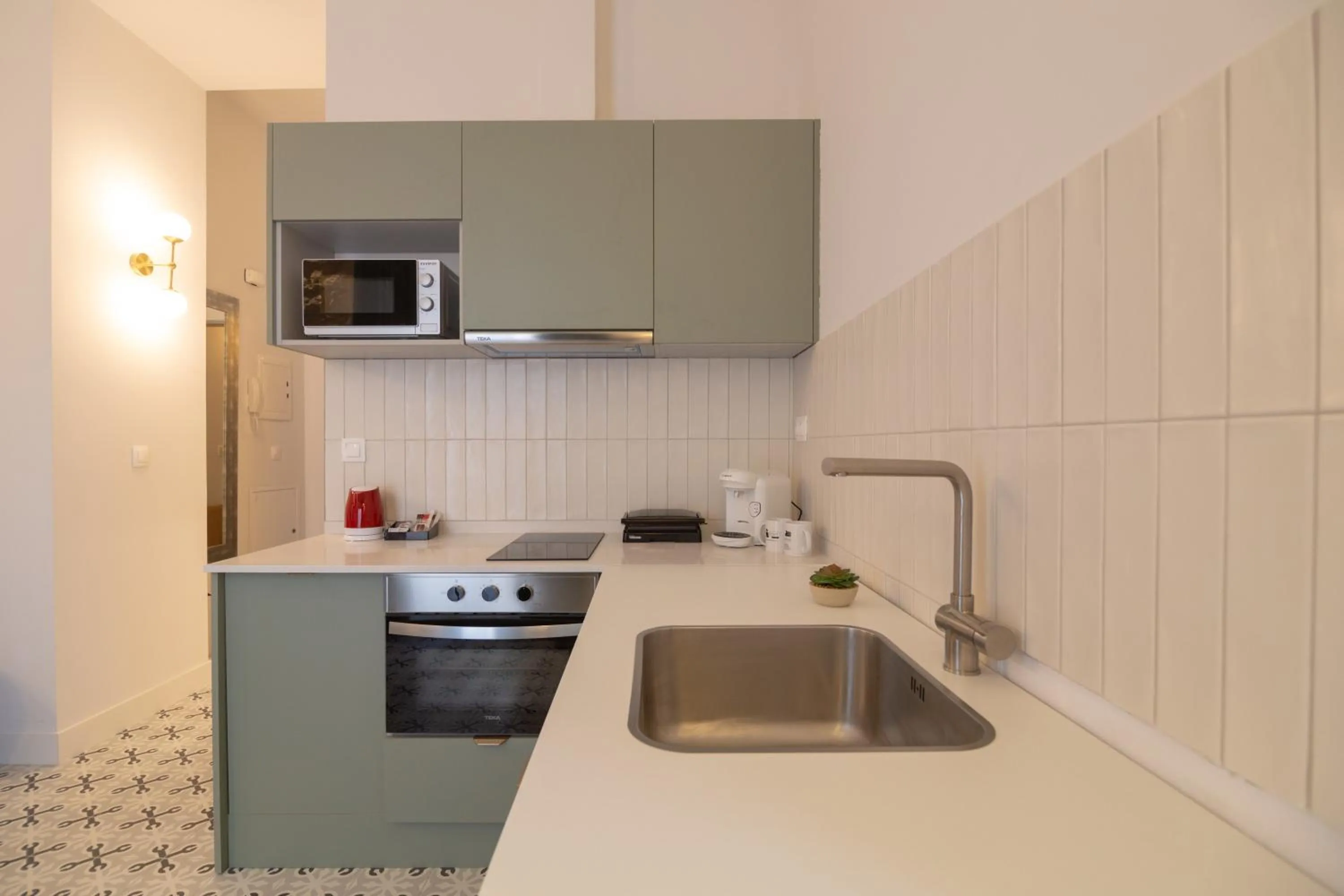 Kitchen or kitchenette in Apartamentos Teatro by Be Alicante