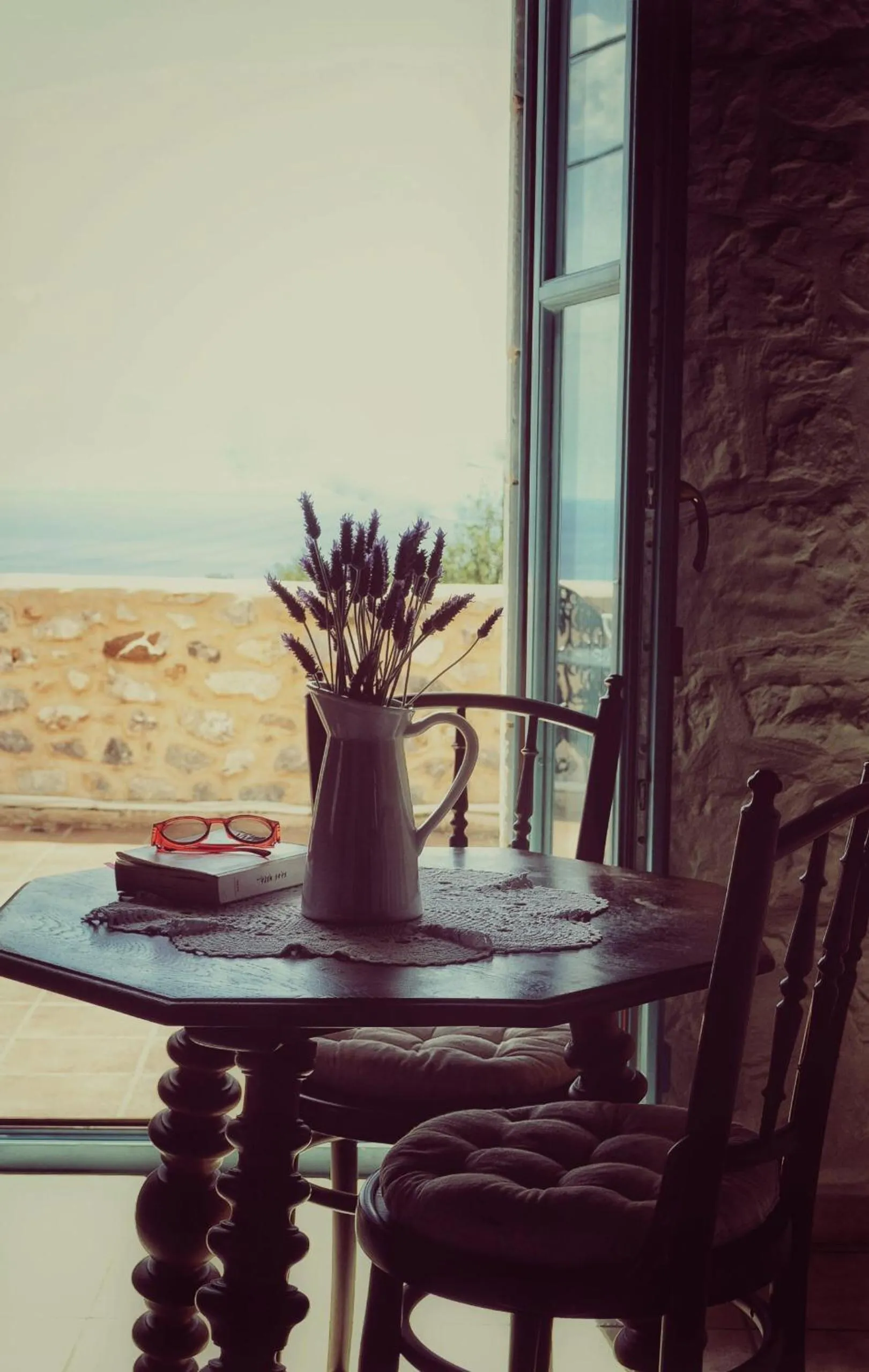 Seating area in Lithos Stone Suites