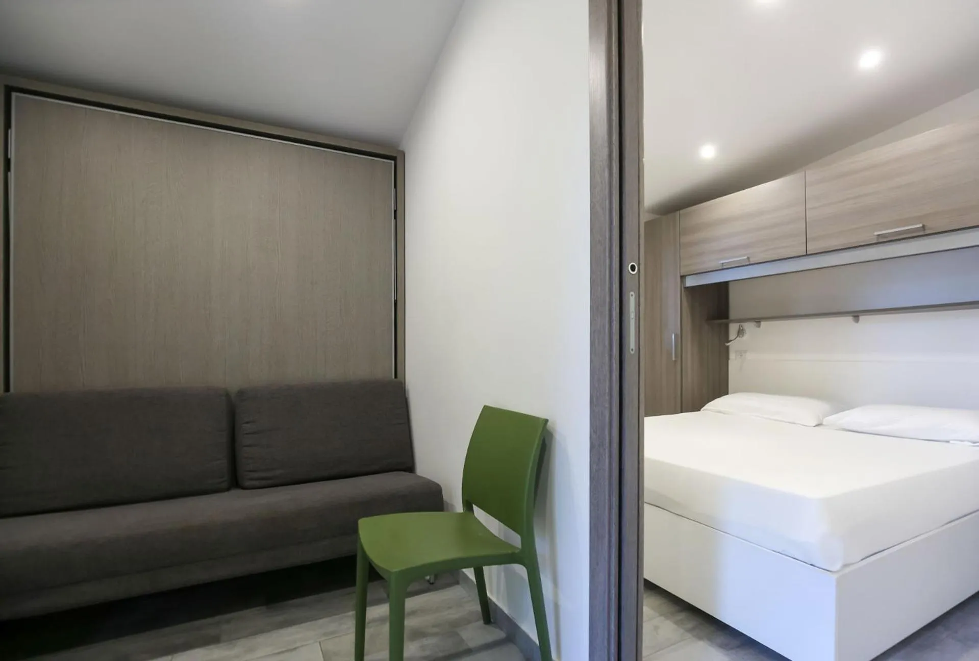 Living room, Bed in Village Camping Santa Fortunata - Campogaio