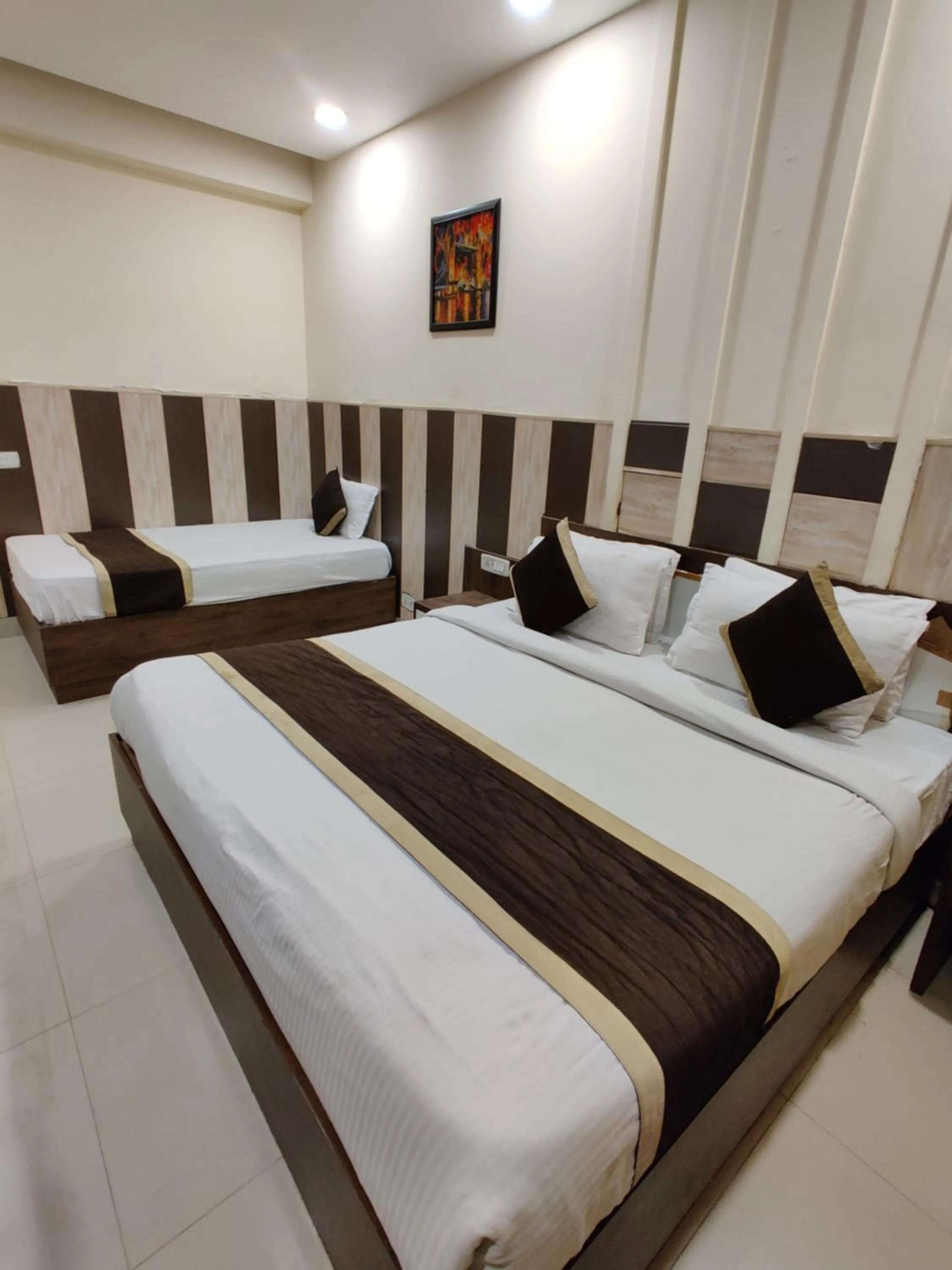 Photo of the whole room, Bed in Raj Darbar - 10 Meter From Golden Temple