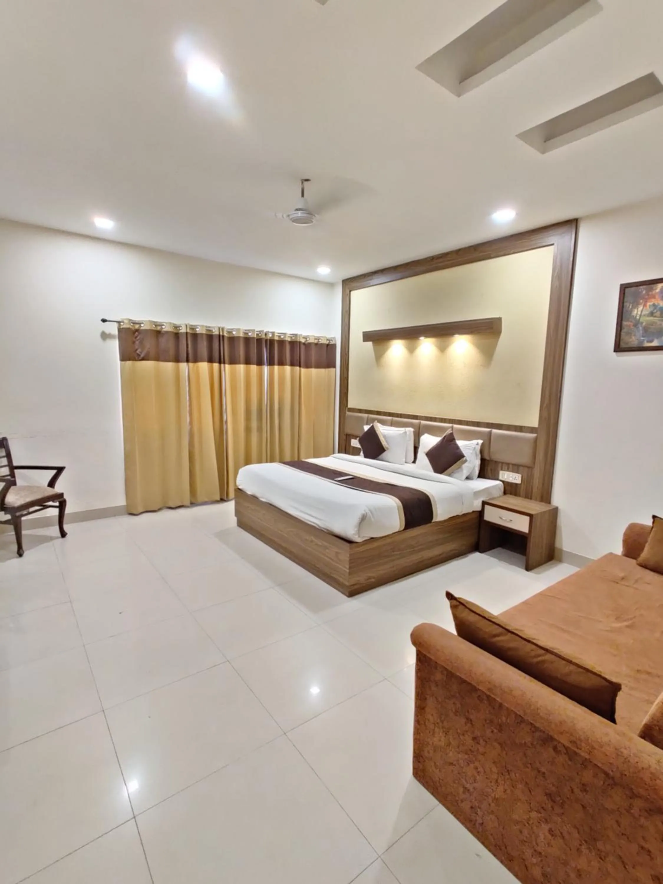 Photo of the whole room, Bed in Raj Darbar - 10 Meter From Golden Temple