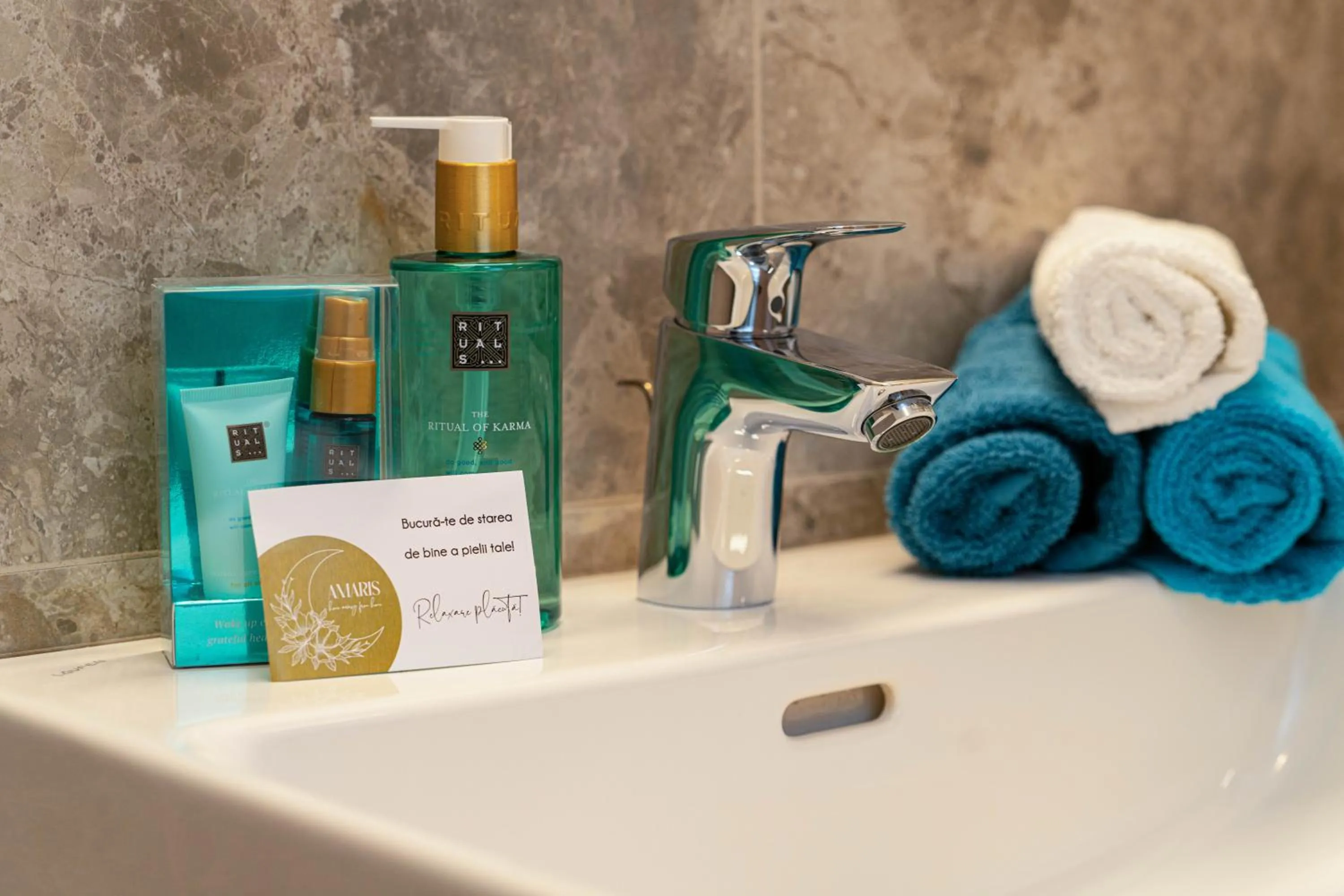 Bathroom in Amaris ApartHotel la 2 Pași de Plajă & Parcare Gratuită