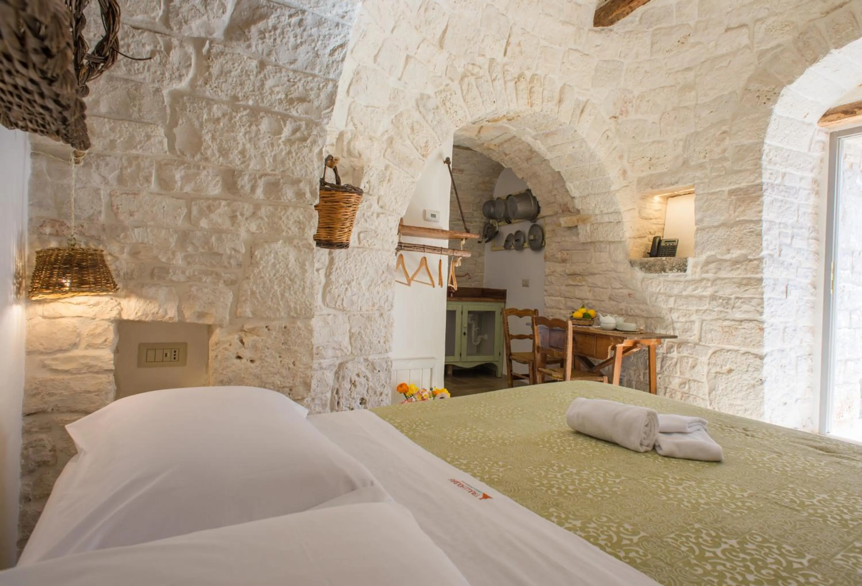 Bedroom, Bed in Trulli Holiday Albergo Diffuso
