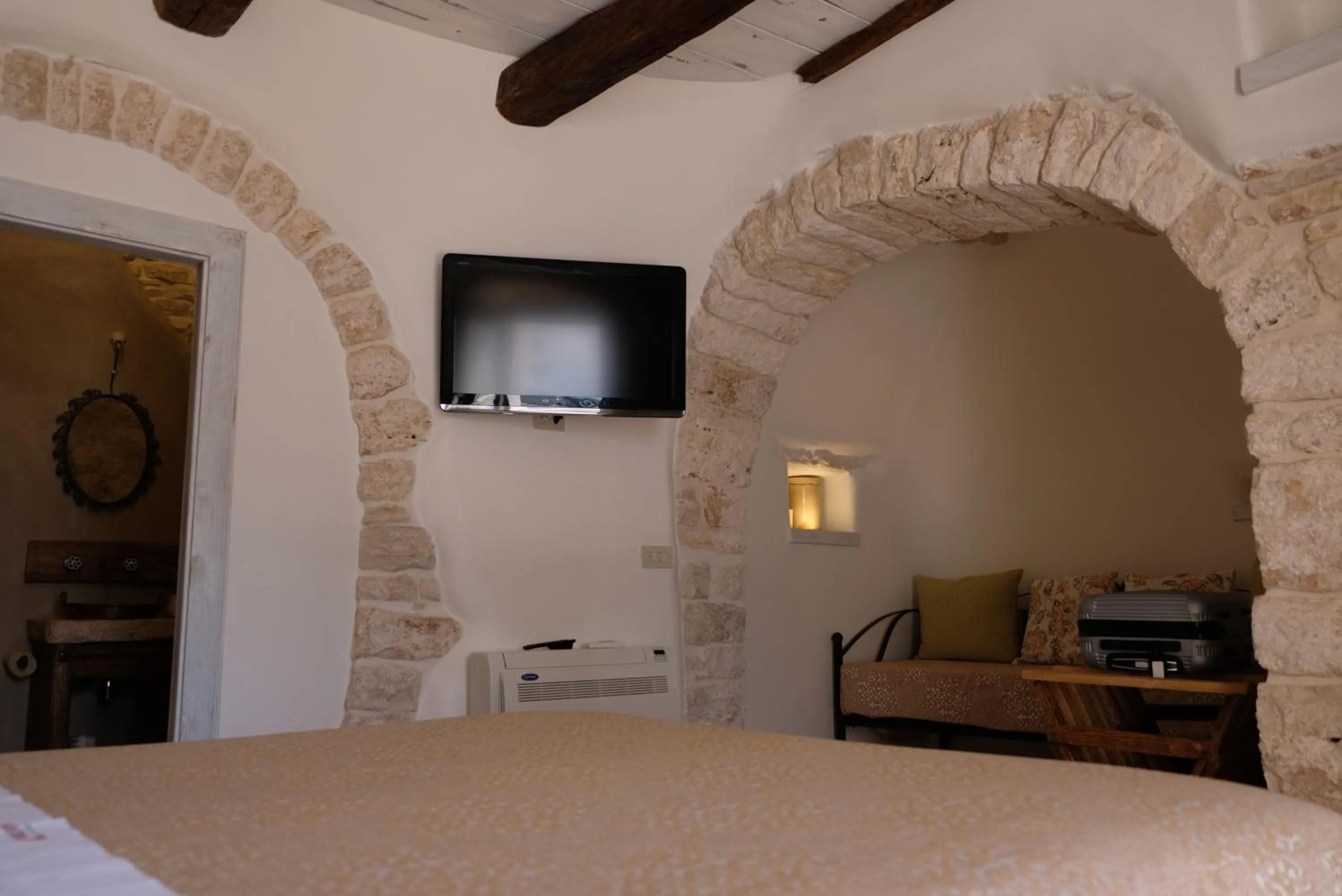 Bedroom, Bed in Trulli Holiday Albergo Diffuso