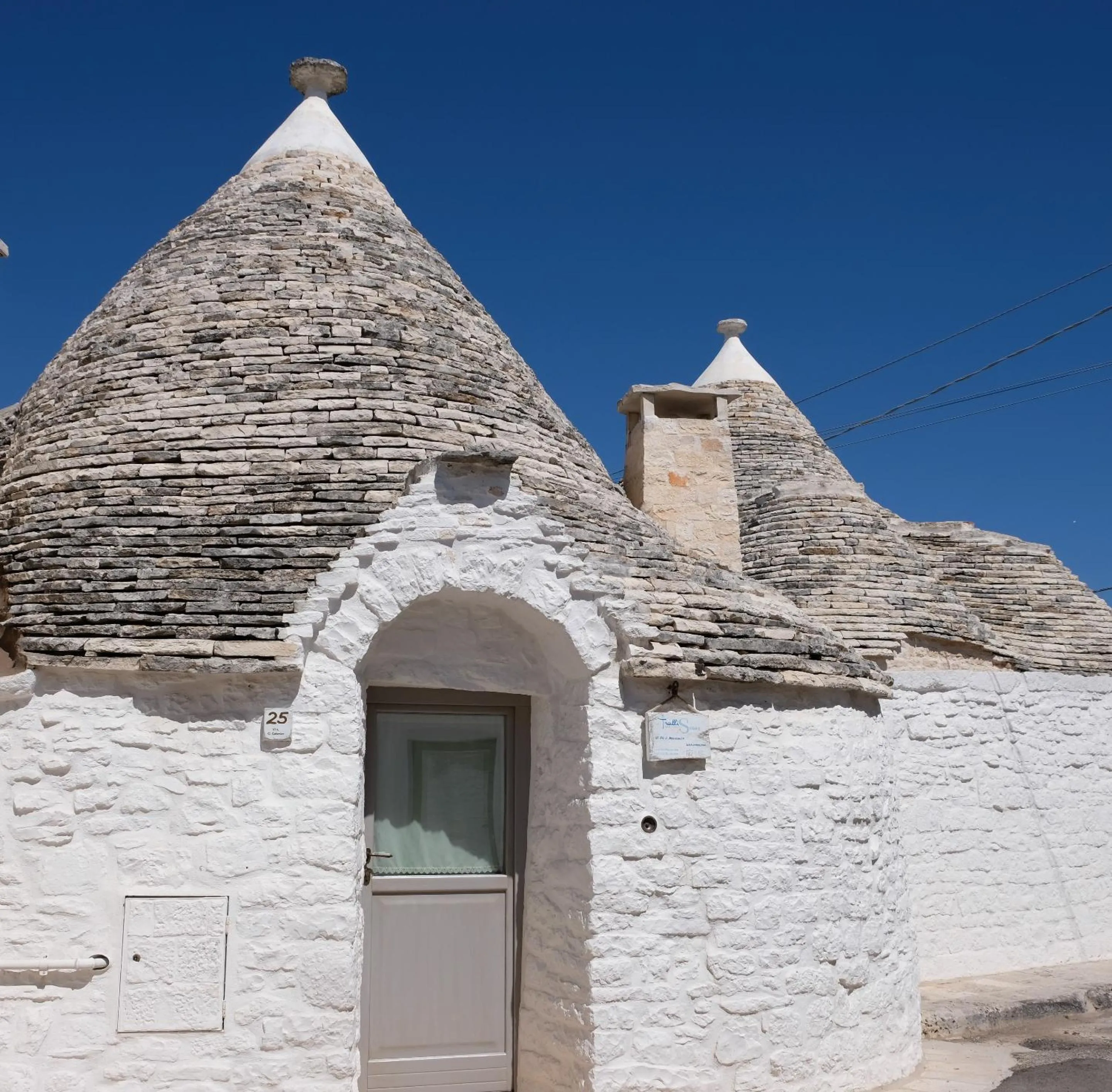 Property building in Trulli Holiday Albergo Diffuso