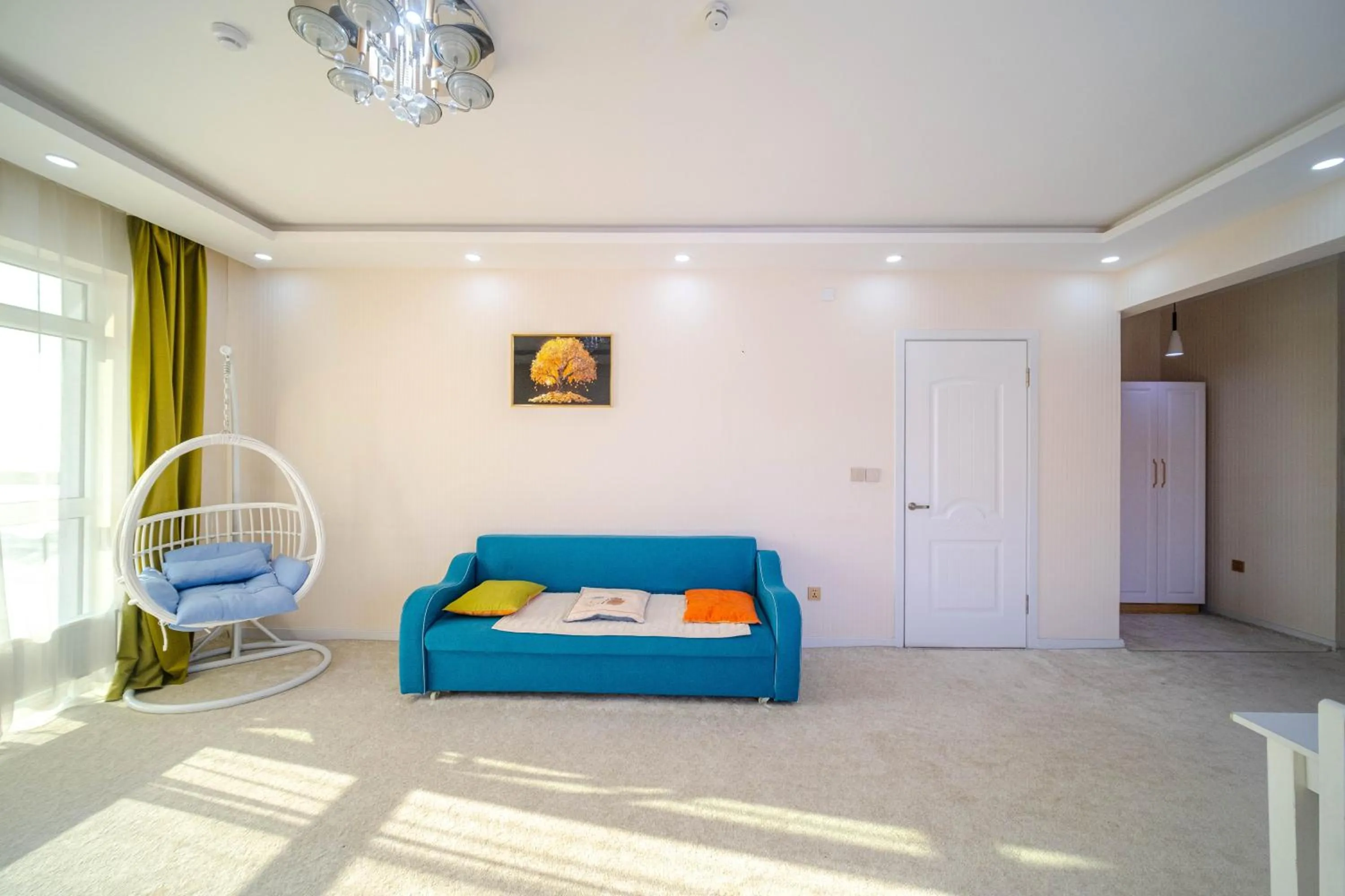 Living room, Bed in Eagle Town Serviced Apartment