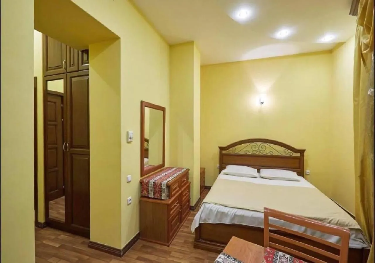 Bed in NEW BELLA HOTEL