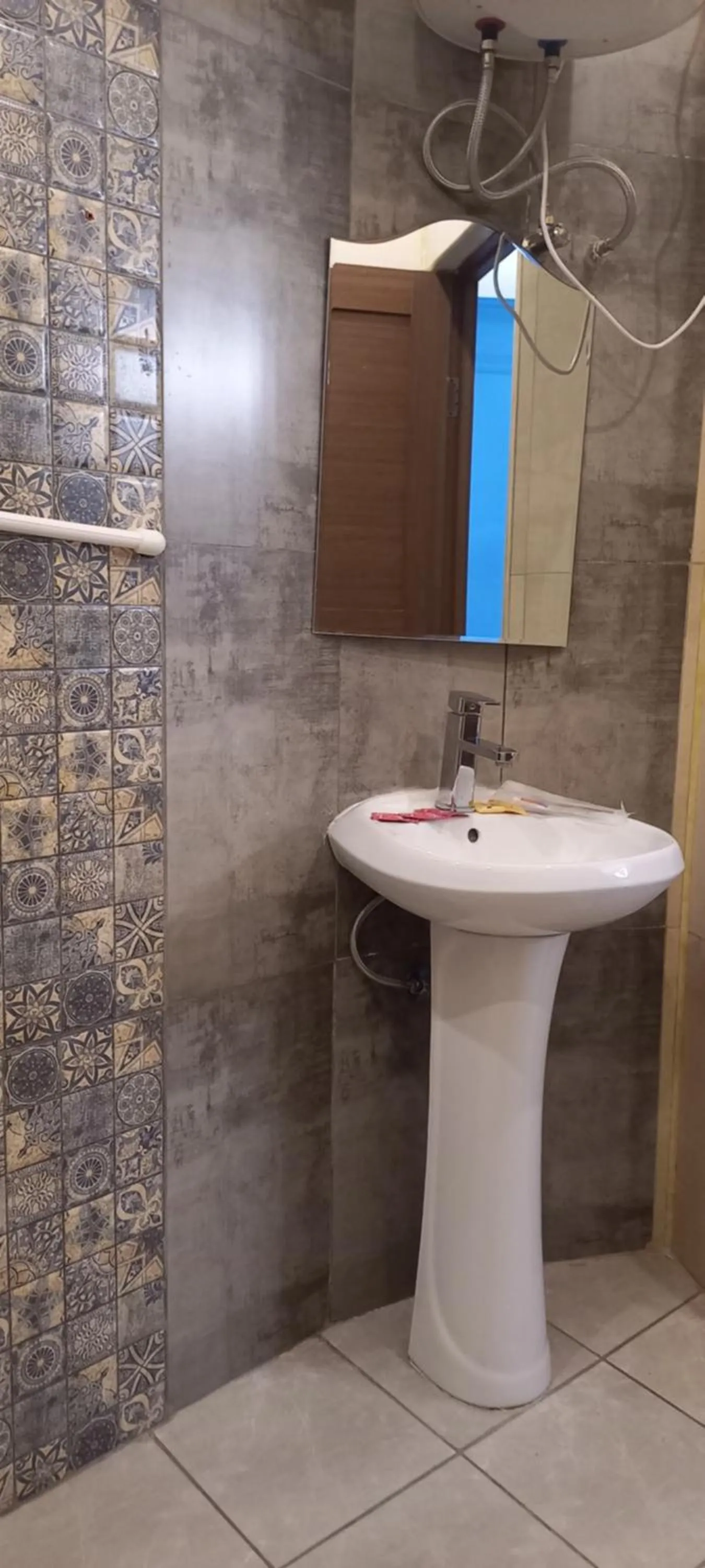 Bathroom in NEW BELLA HOTEL