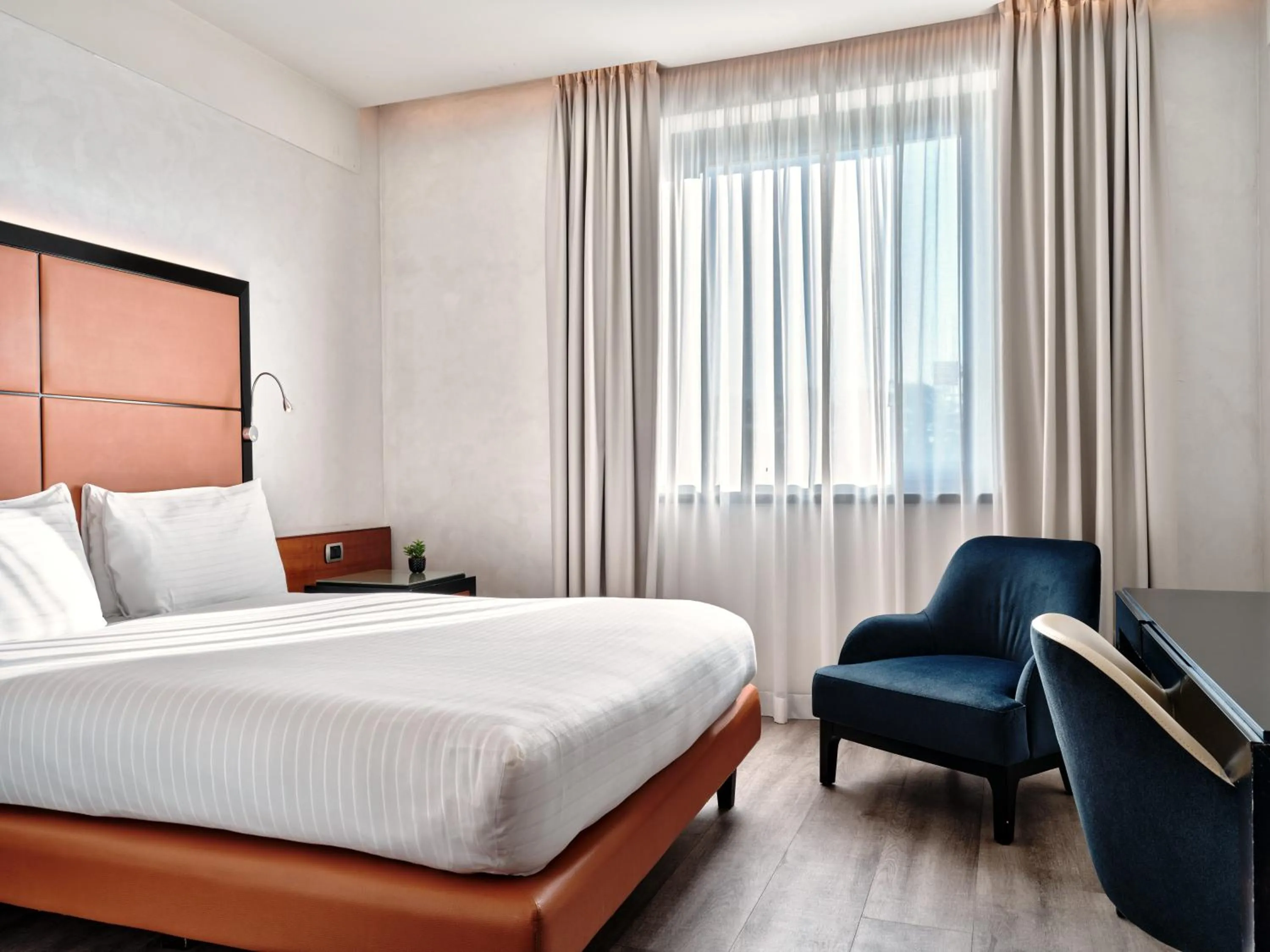 Bedroom, Bed in Crowne Plaza Milan - Malpensa Airport by IHG