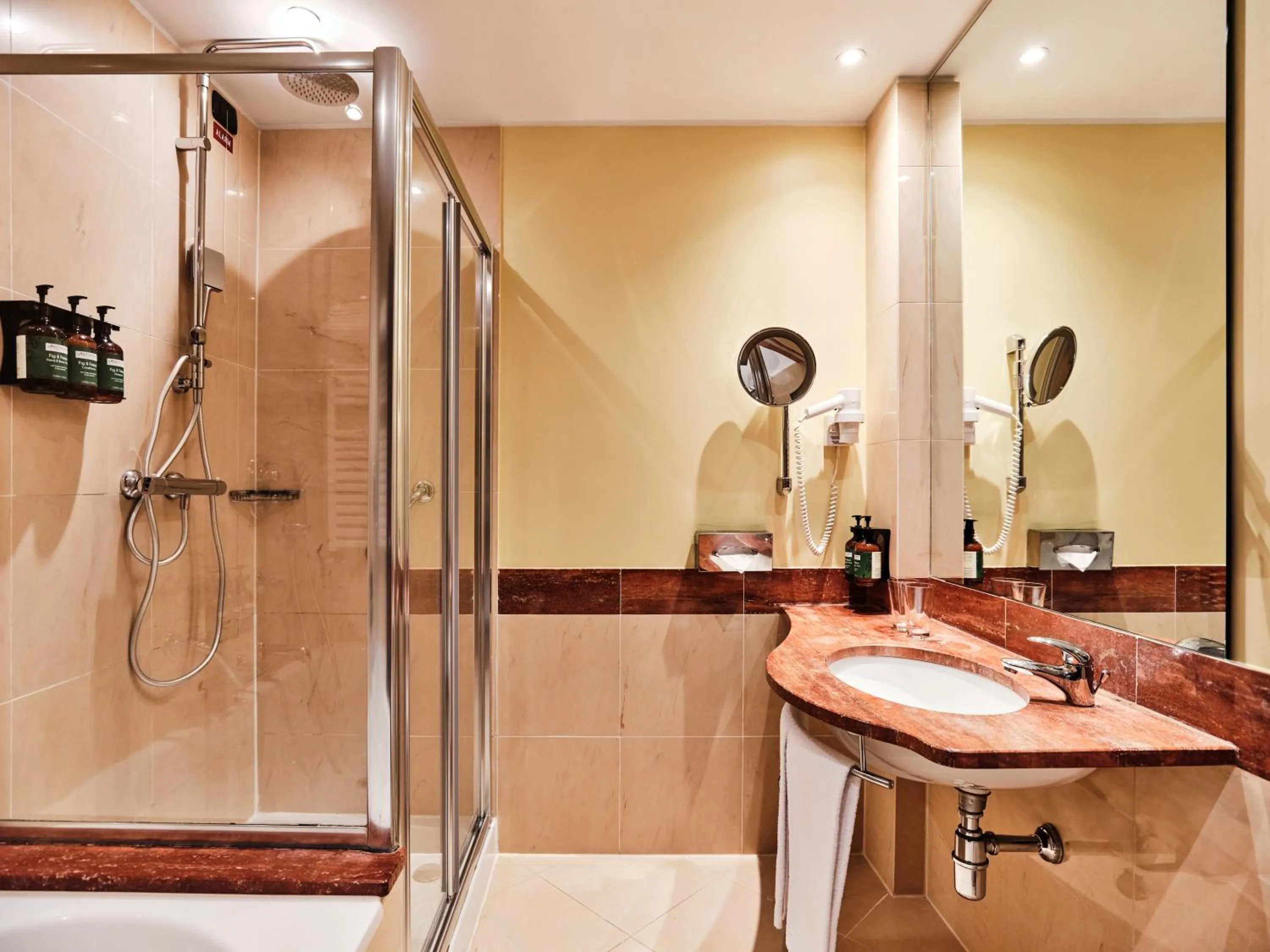 Toilet in Crowne Plaza Milan - Malpensa Airport by IHG