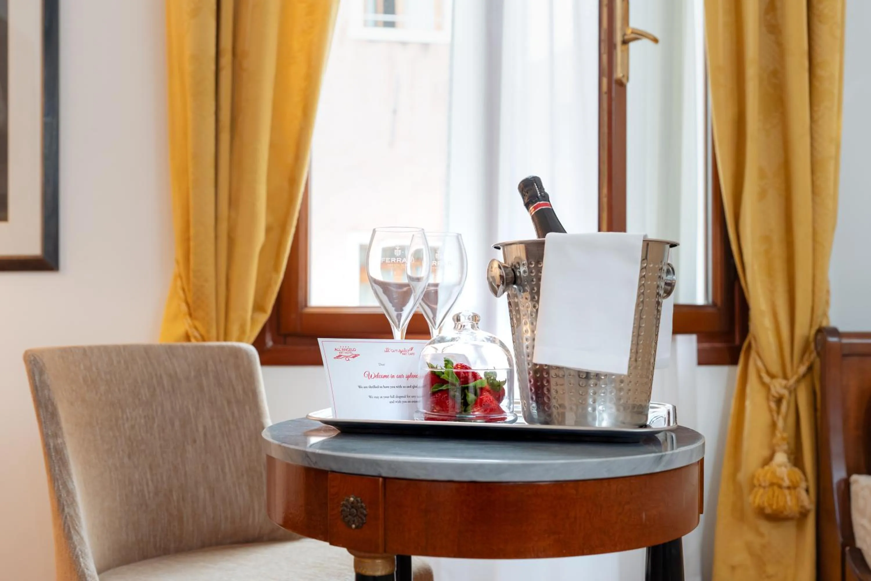 Seating area in All’Angelo Art Hotel