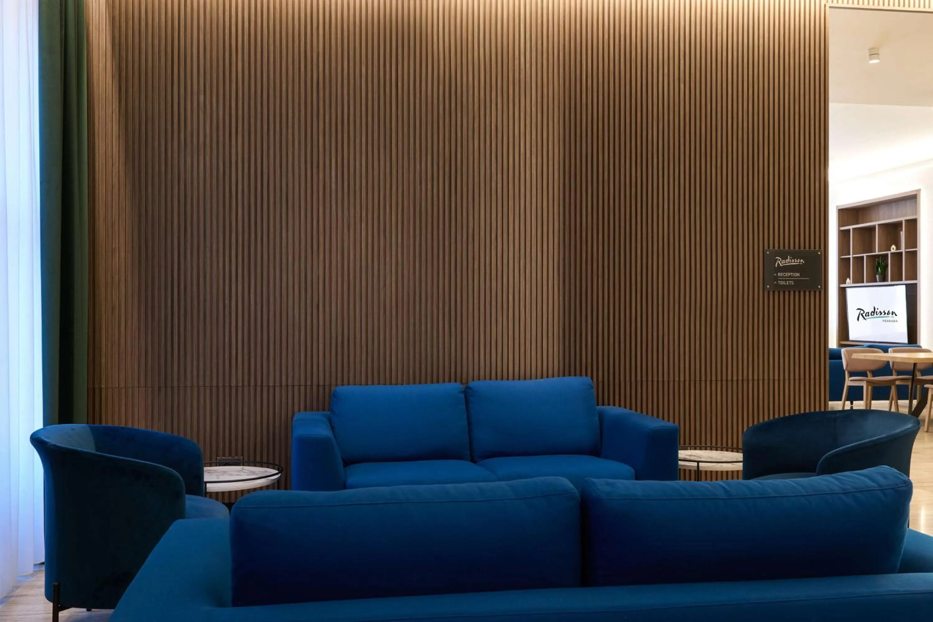 Lounge or bar in Radisson Hotel Ferrara