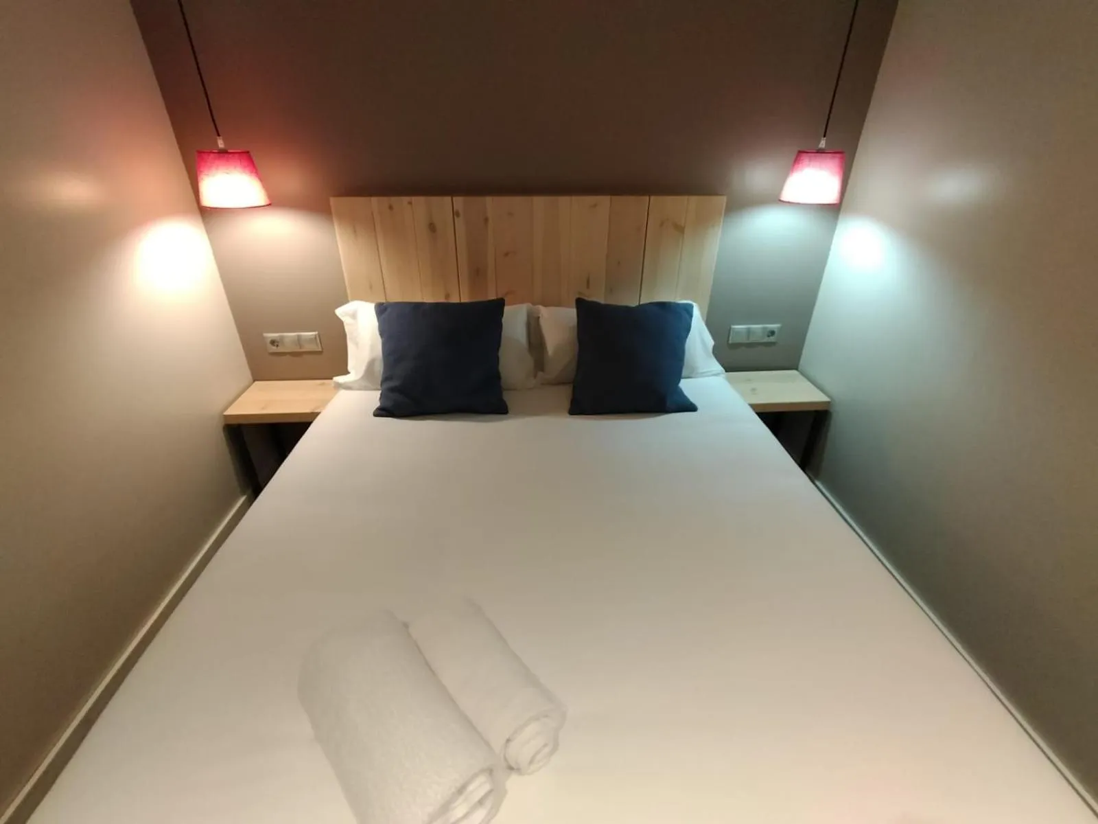 Bed in Montserrat Apartments by gaiarooms