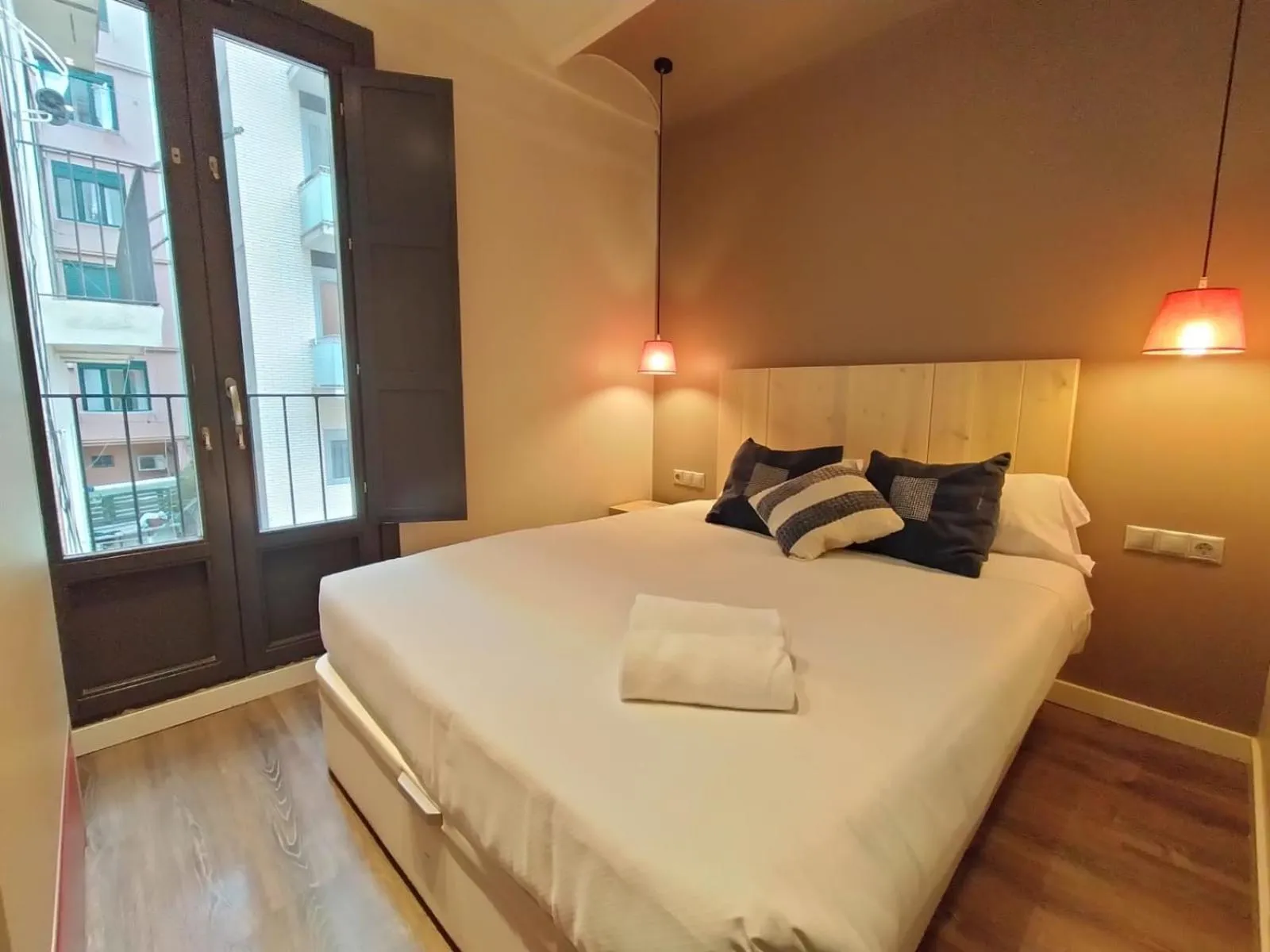 Bed in Montserrat Apartments by gaiarooms