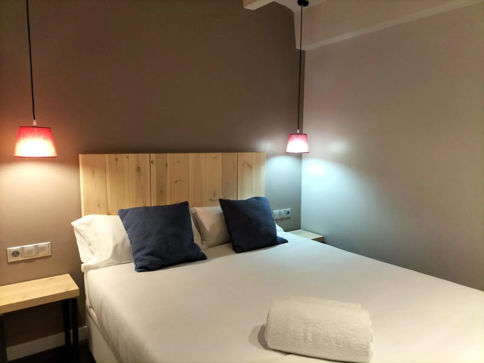 Bed in Montserrat Apartments by gaiarooms