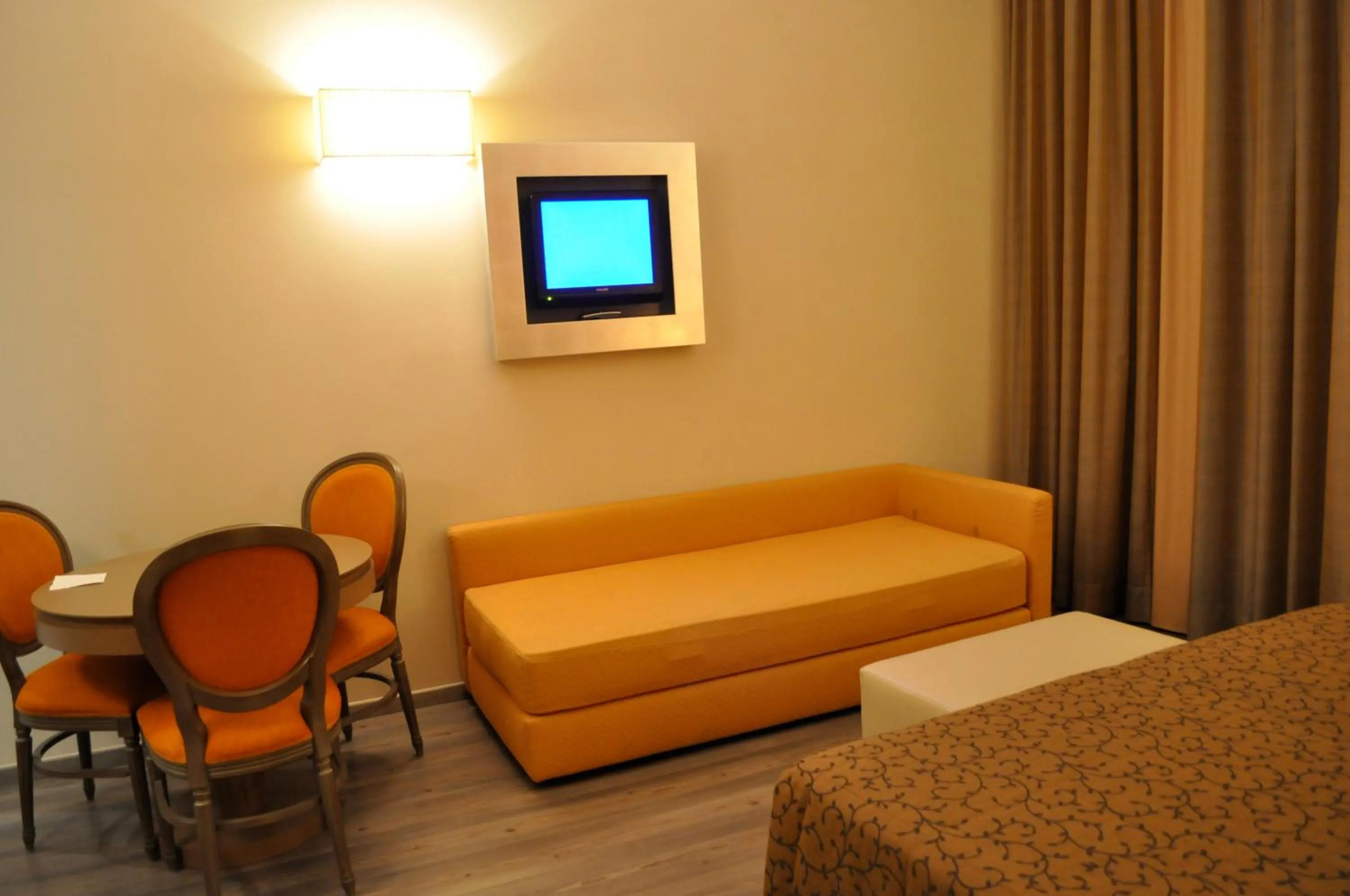 Seating area, Bed in Residence La Repubblica