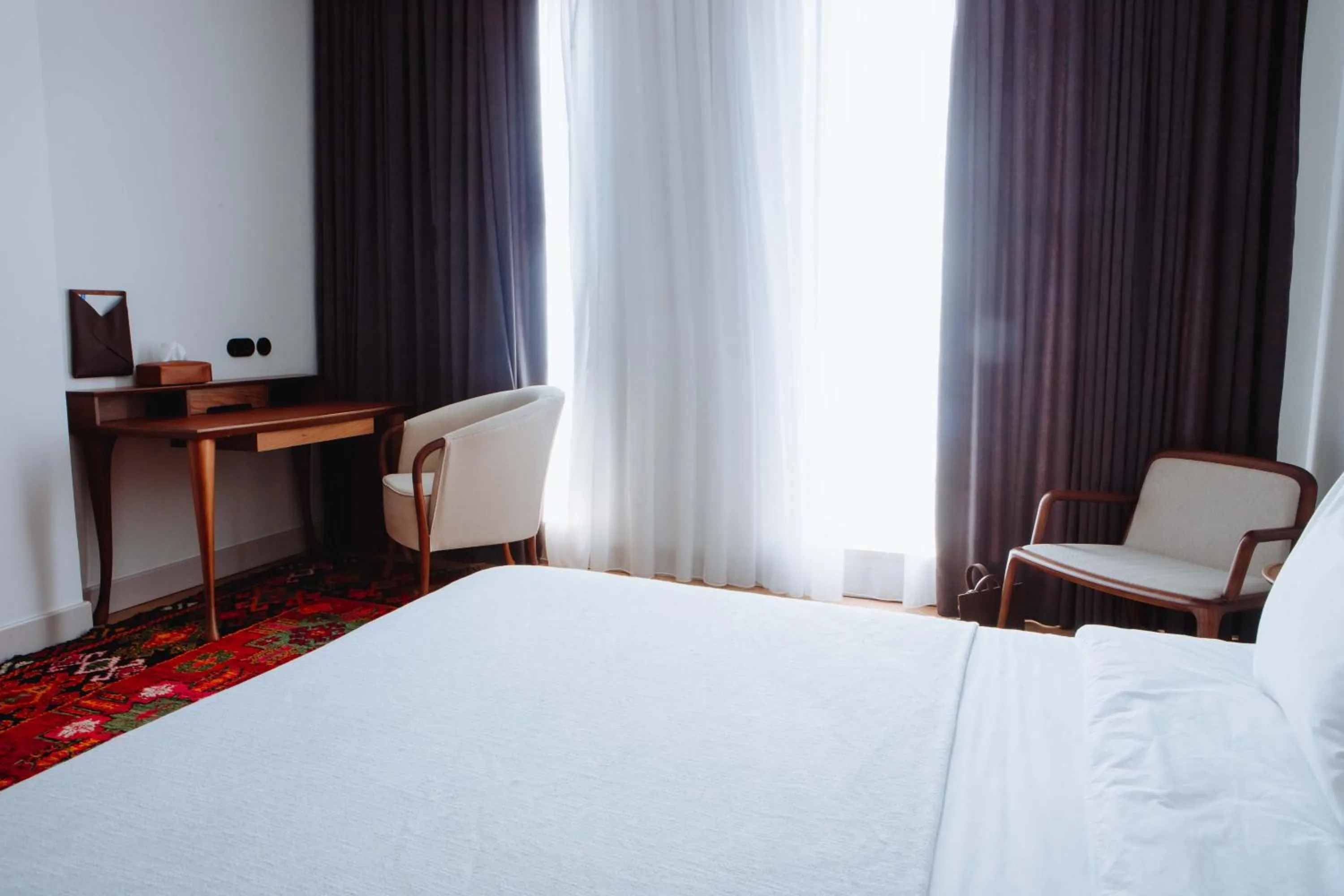 Bed in Pana Boutique Hotel