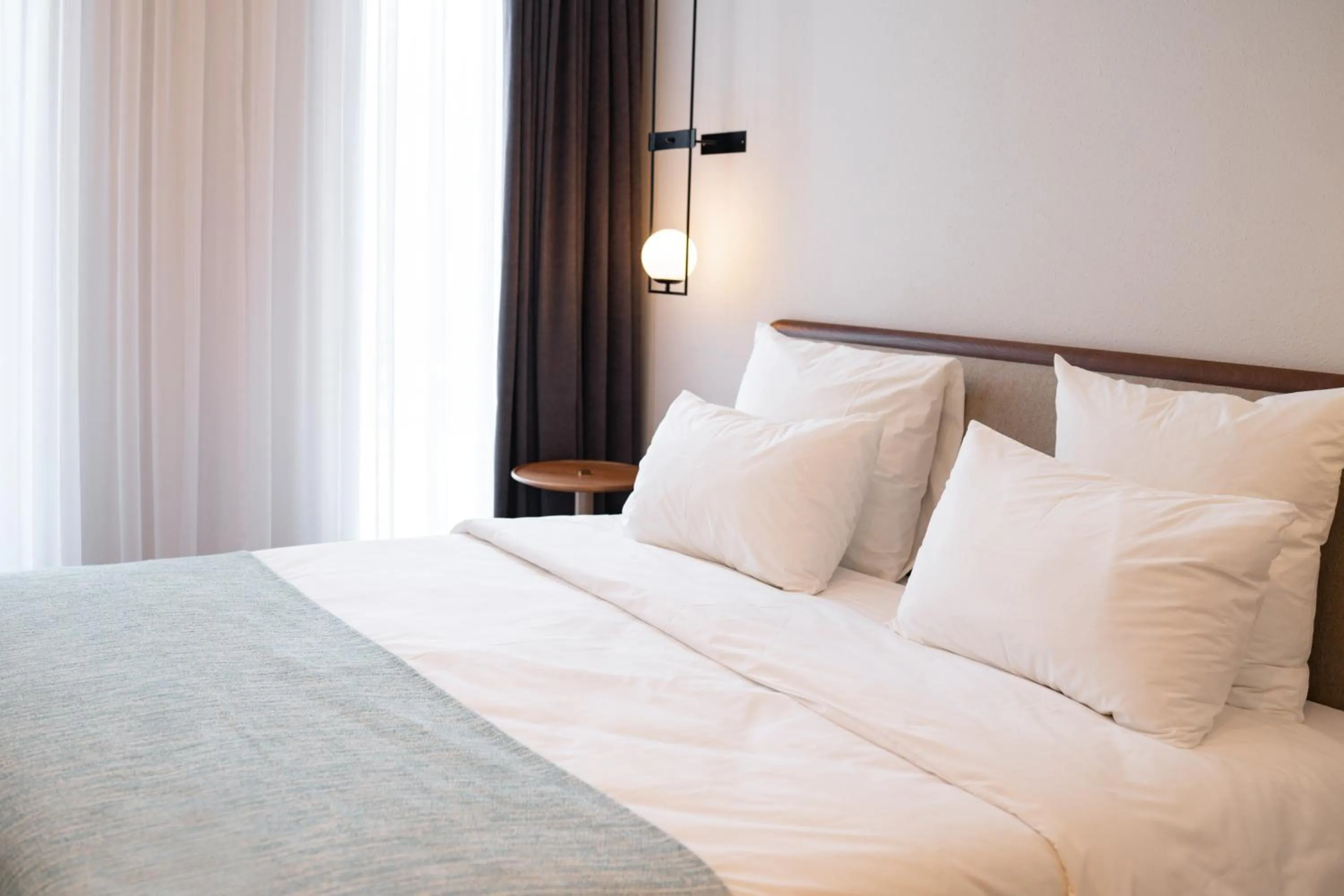 Bed in Pana Boutique Hotel