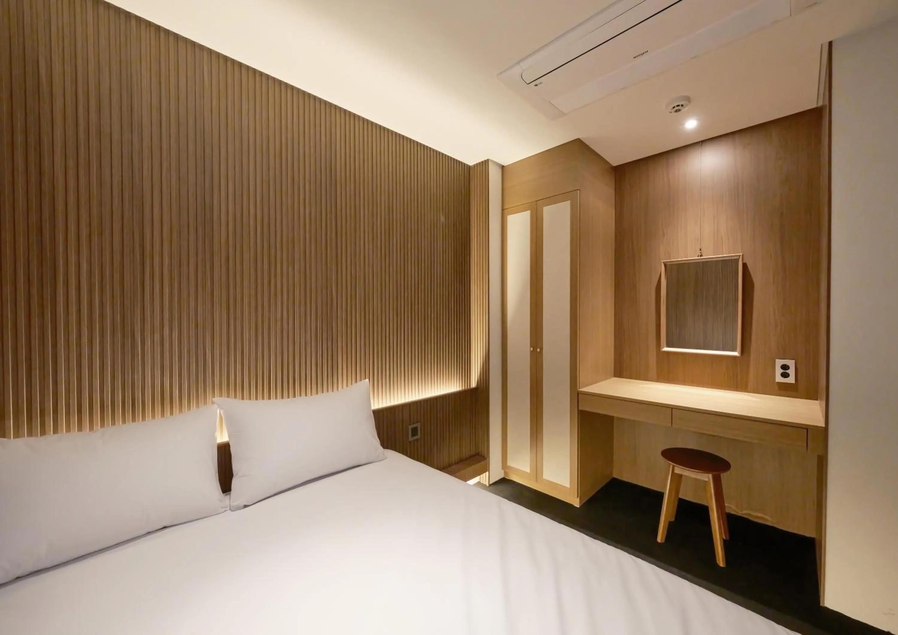Bedroom, TV/Entertainment Center in UH Suite The Myeongdong
