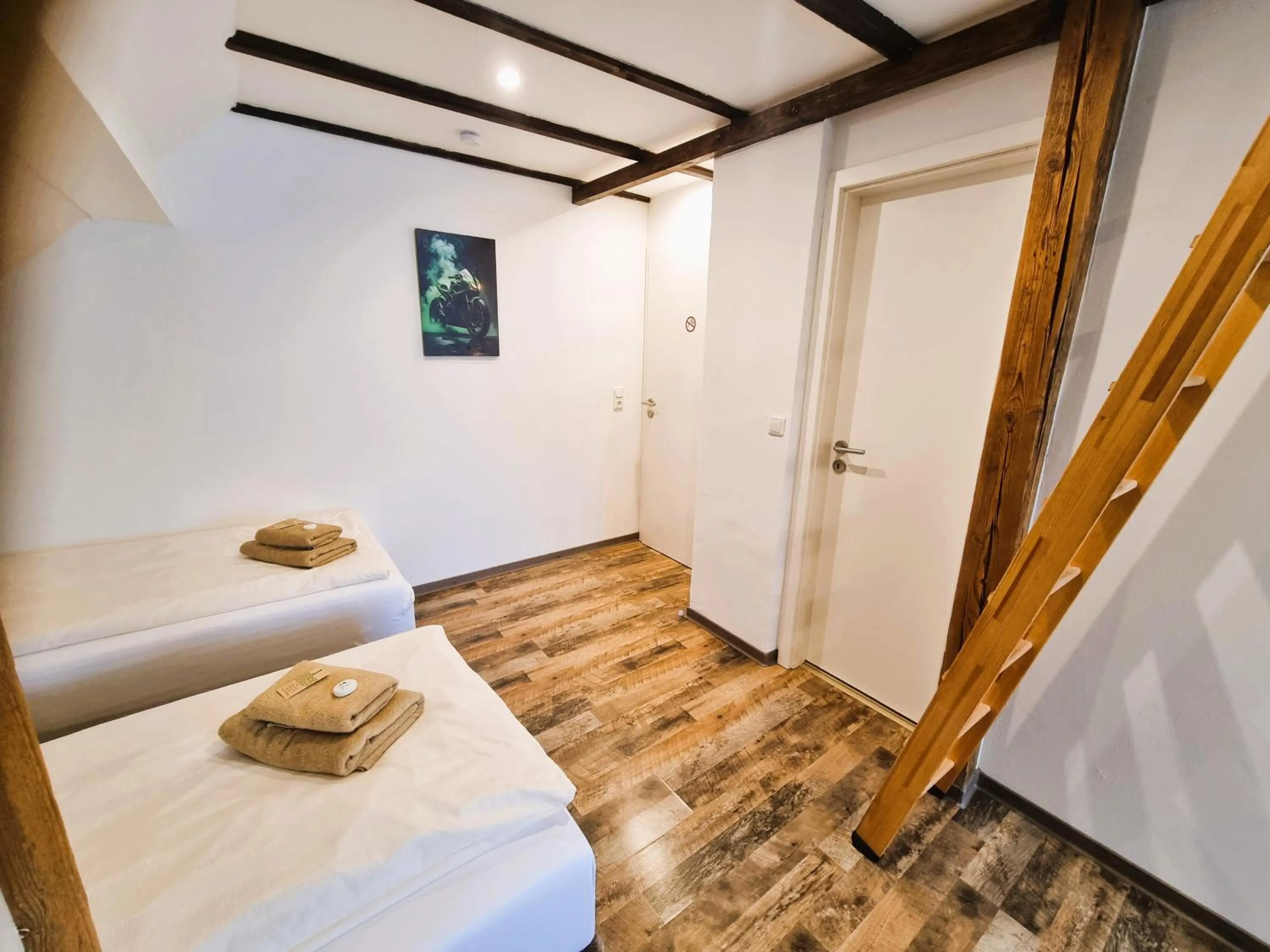 Photo of the whole room, Bed in CJS Apartments - Chill or Drive am Nürburgring, new Box Spring Beds, new furniture, WLan, Spacious Rooms, Quiet Location