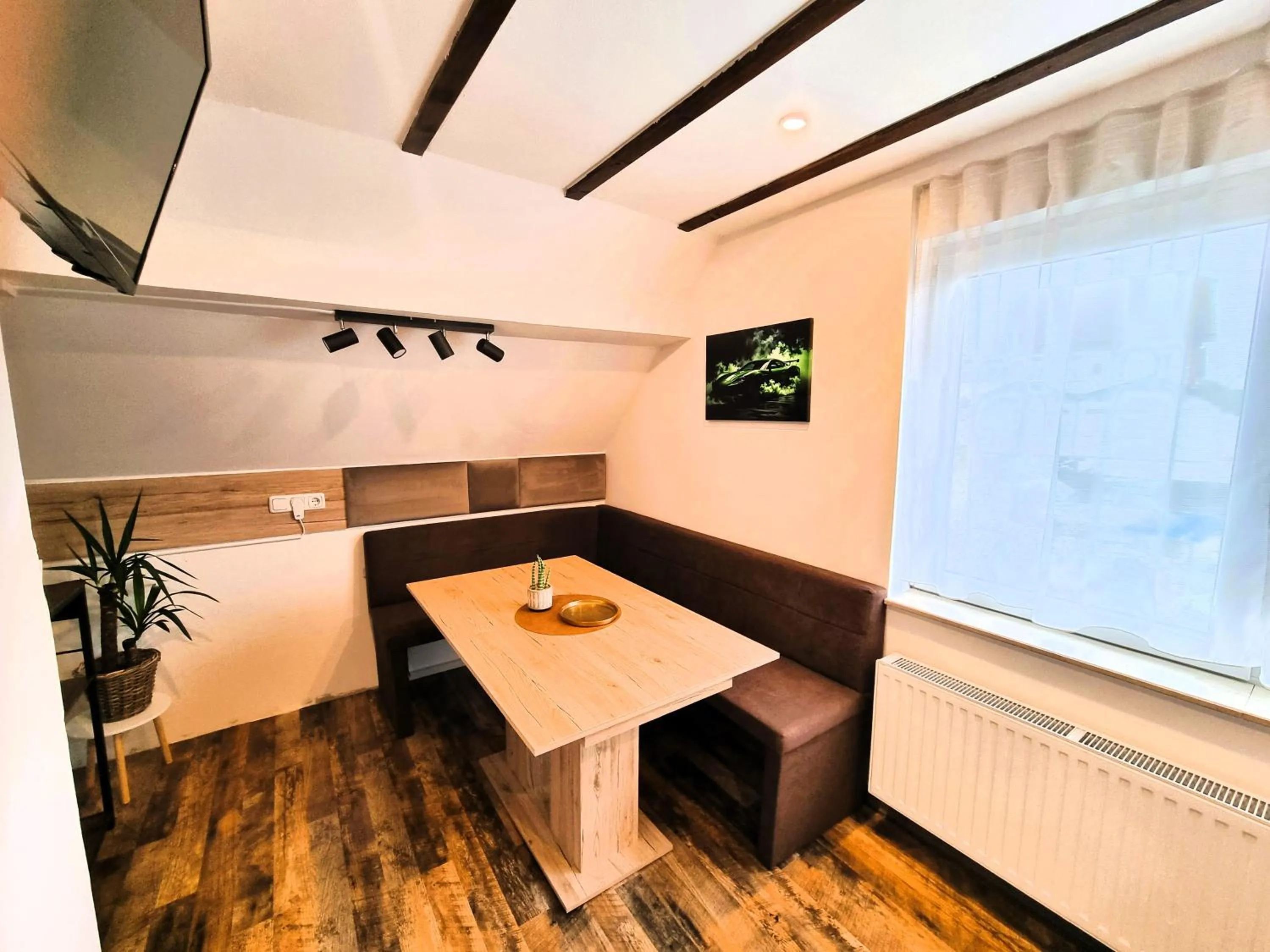 Seating area in CJS Apartments - Chill or Drive am Nürburgring, new Box Spring Beds, new furniture, WLan, Spacious Rooms, Quiet Location