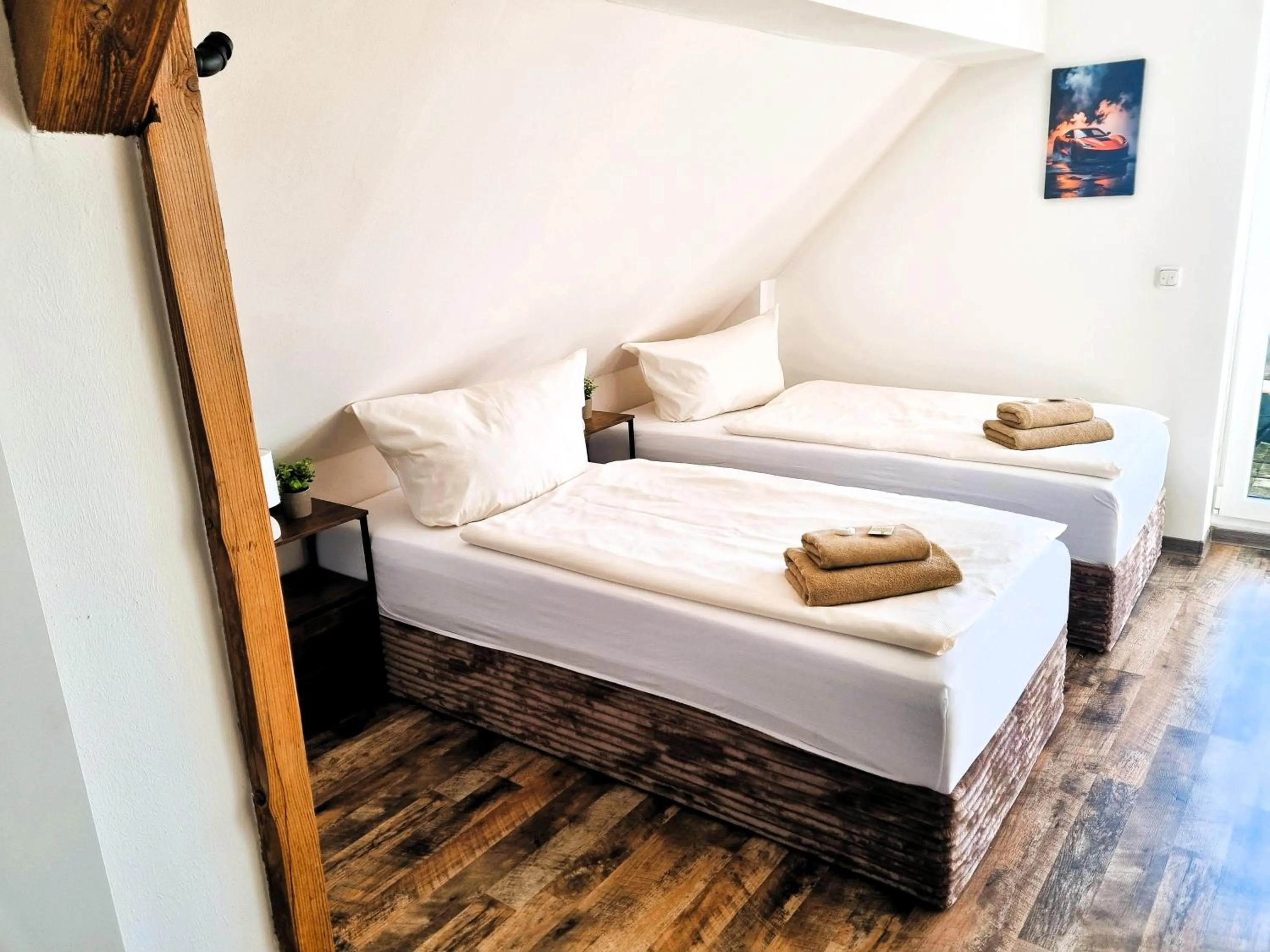 Bed in CJS Apartments - Chill or Drive am Nürburgring, new Box Spring Beds, new furniture, WLan, Spacious Rooms, Quiet Location