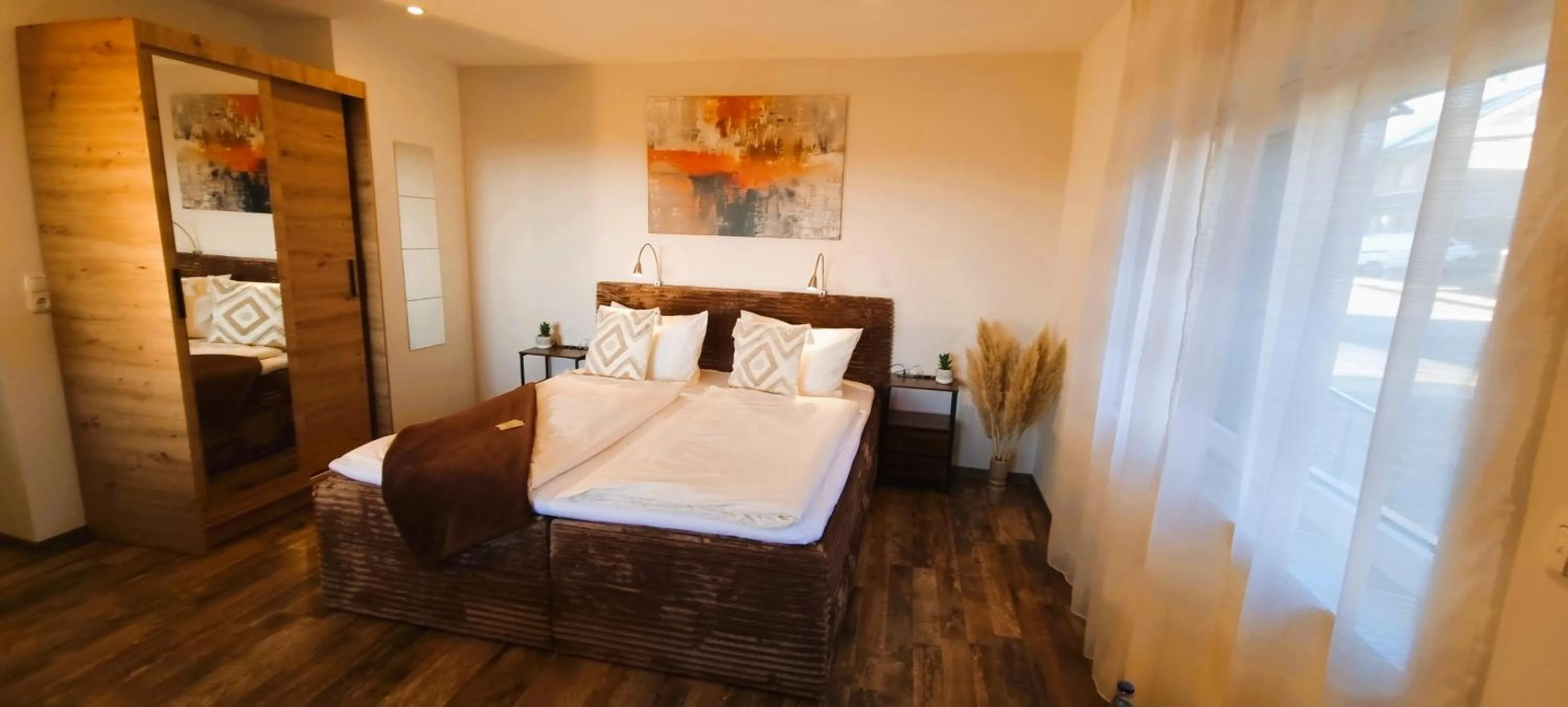 Bed in CJS Apartments - Chill or Drive am Nürburgring, new Box Spring Beds, new furniture, WLan, Spacious Rooms, Quiet Location