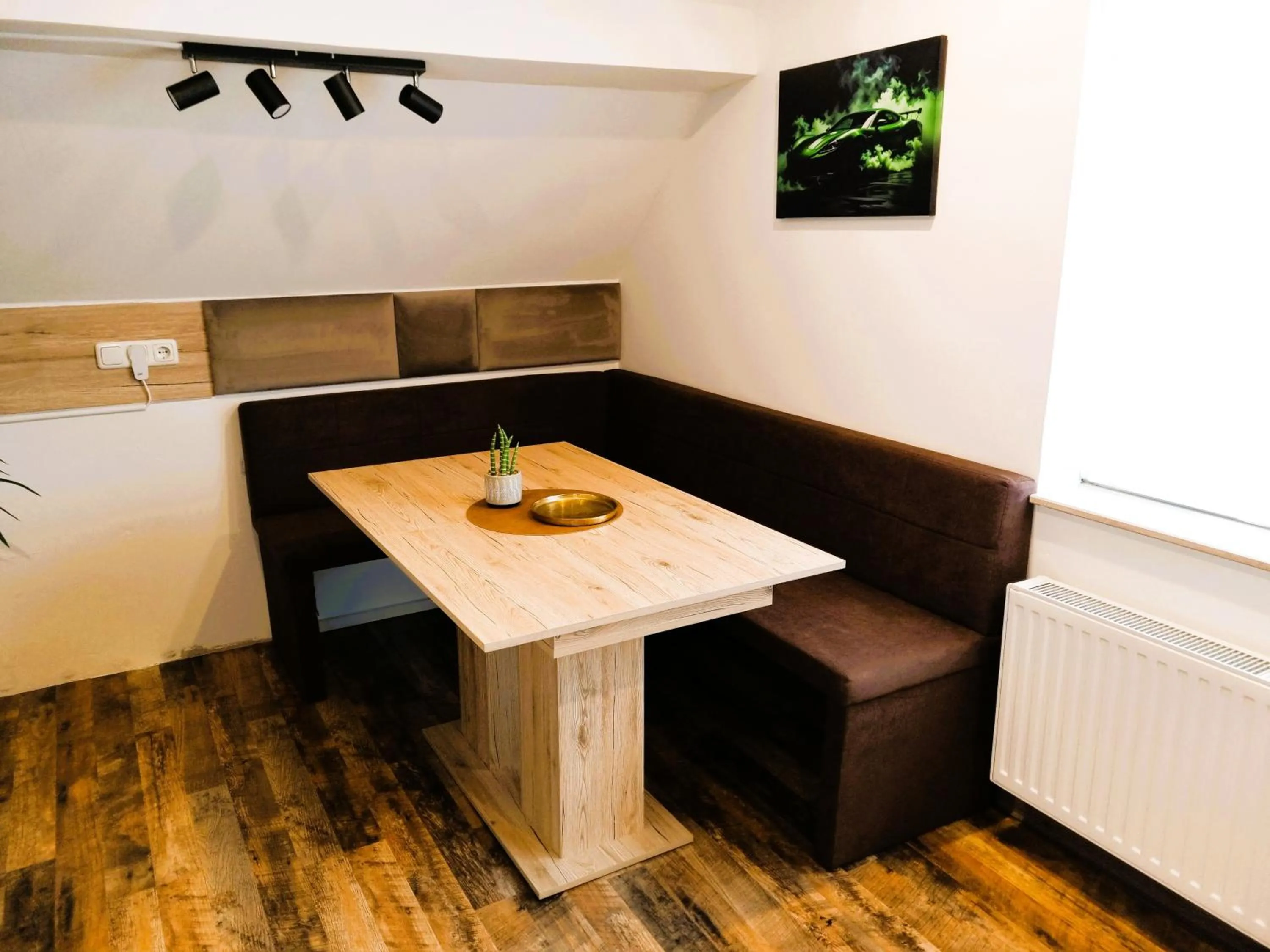 Seating area in CJS Apartments - Chill or Drive am Nürburgring, new Box Spring Beds, new furniture, WLan, Spacious Rooms, Quiet Location