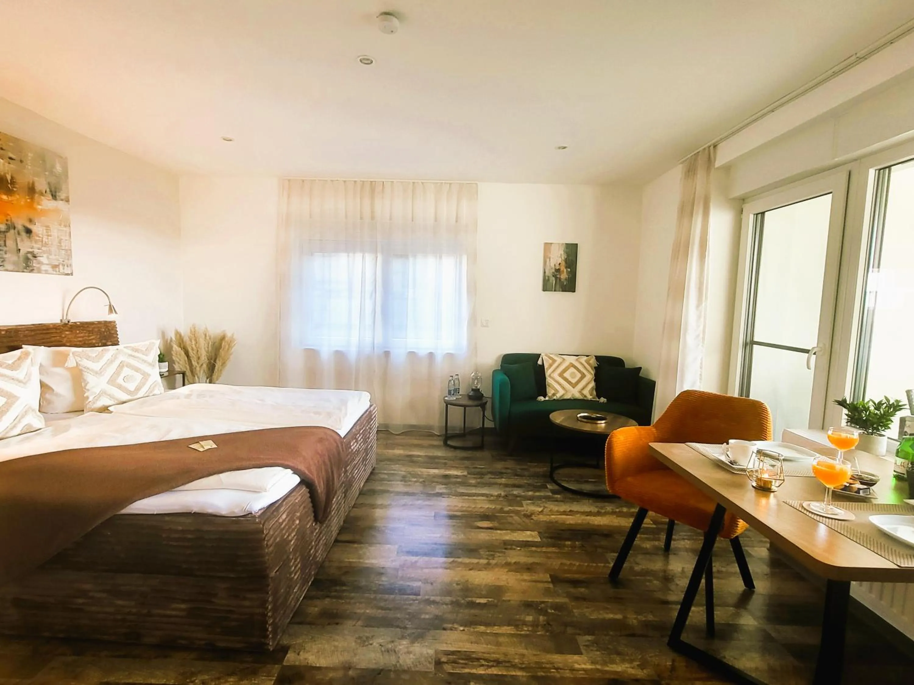 Photo of the whole room, Bed in CJS Apartments - Chill or Drive am Nürburgring, new Box Spring Beds, new furniture, WLan, Spacious Rooms, Quiet Location