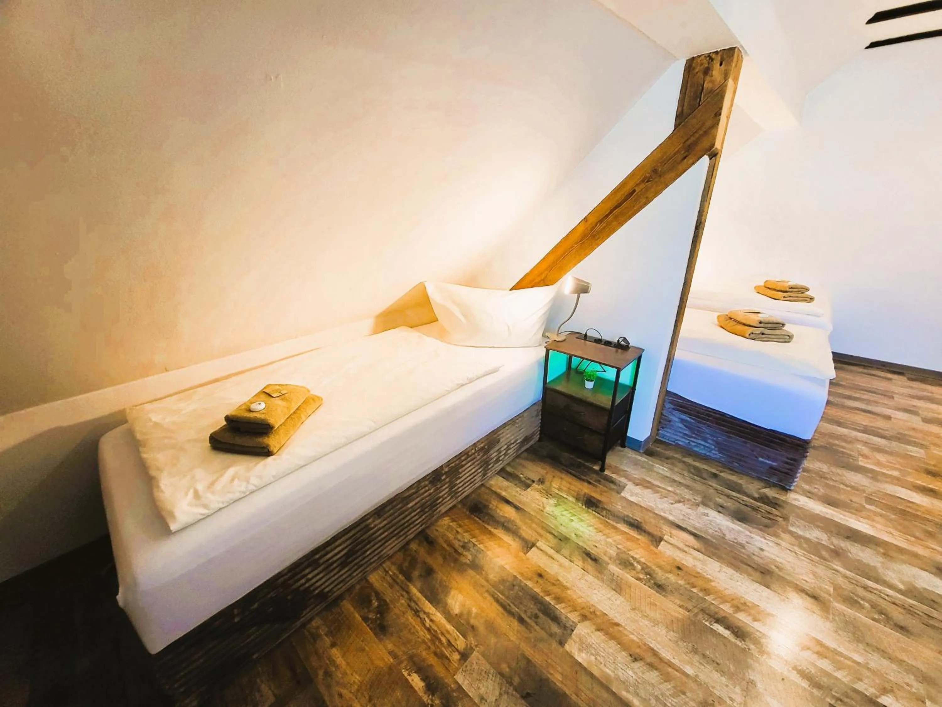 Photo of the whole room, Bed in CJS Apartments - Chill or Drive am Nürburgring, new Box Spring Beds, new furniture, WLan, Spacious Rooms, Quiet Location