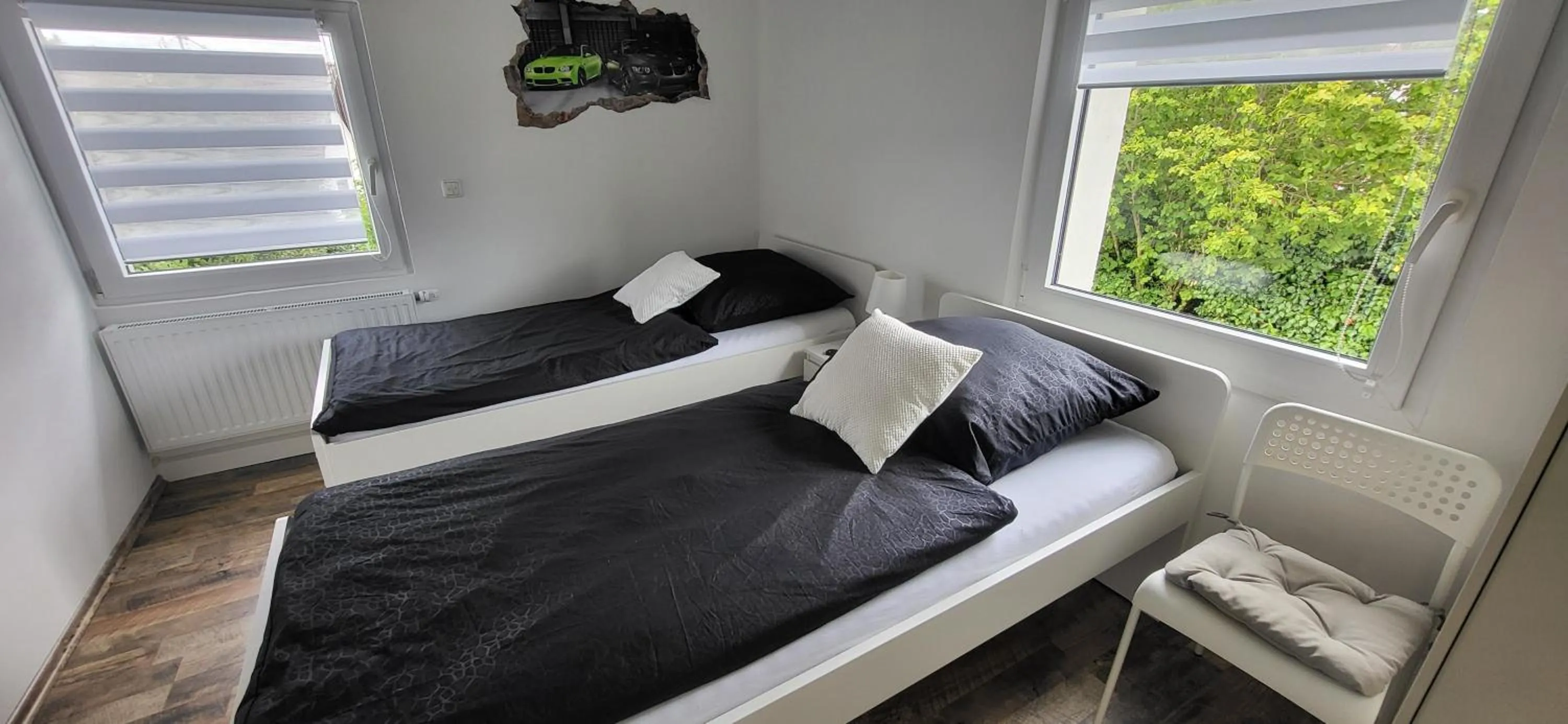 Photo of the whole room in CJS Apartments - Chill or Drive am Nürburgring, Free Parking, WLan, Spacious Rooms, Quiet Location