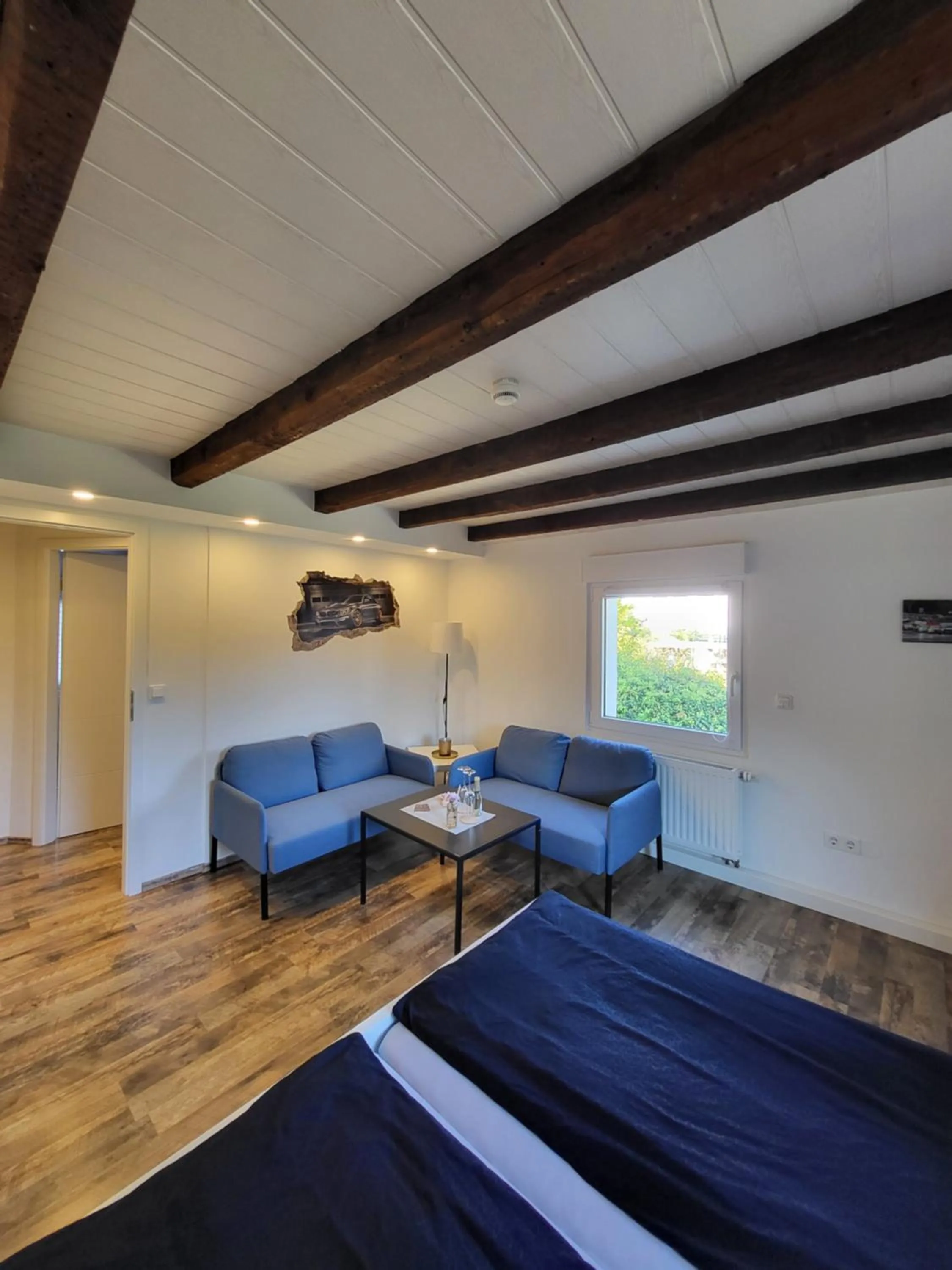 Seating area in CJS Apartments - Chill or Drive am Nürburgring, Free Parking, WLan, Spacious Rooms, Quiet Location