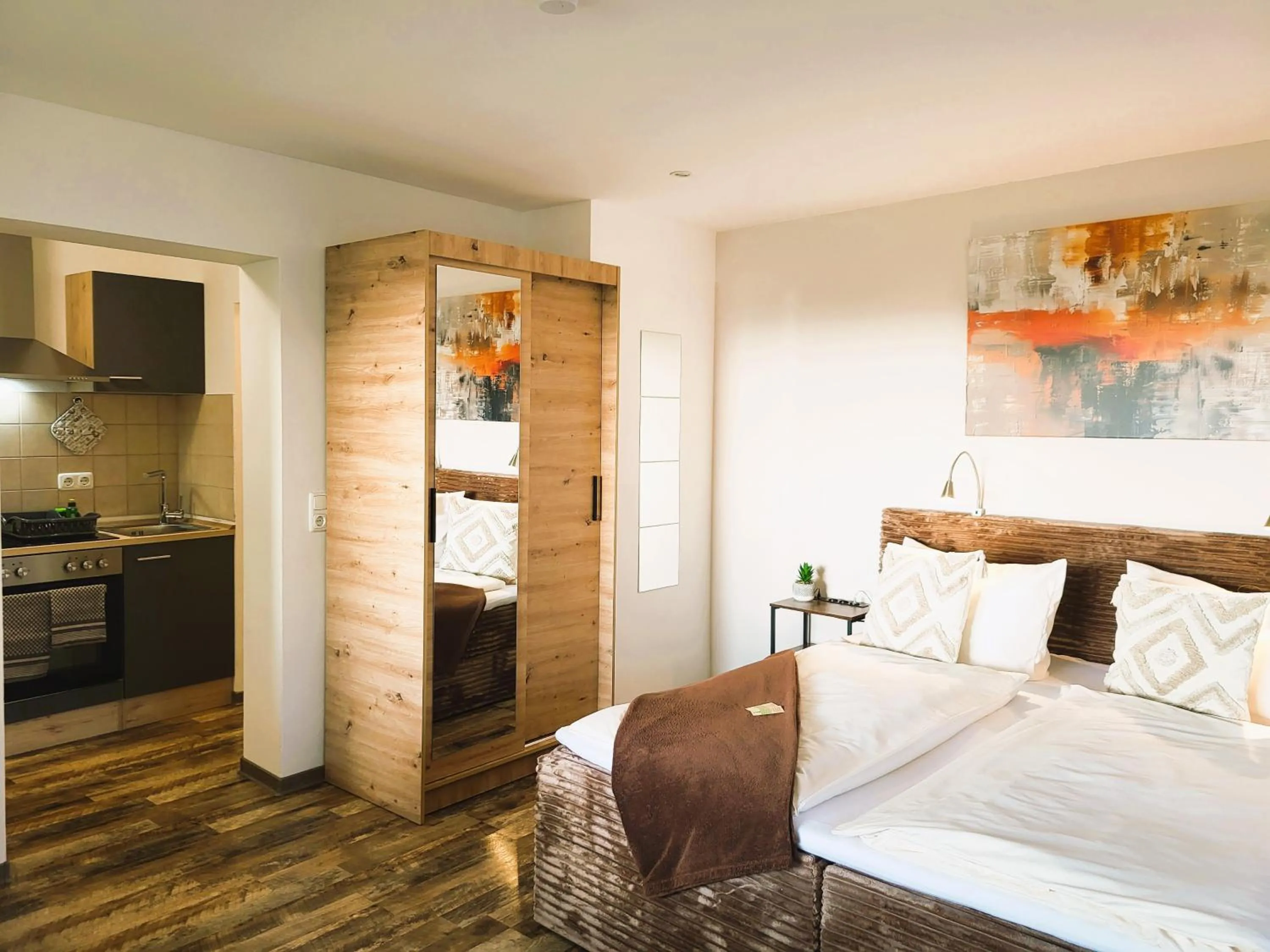 Bed in CJS Apartments - Chill or Drive am Nürburgring, new Box Spring Beds, new furniture, WLan, Spacious Rooms, Quiet Location