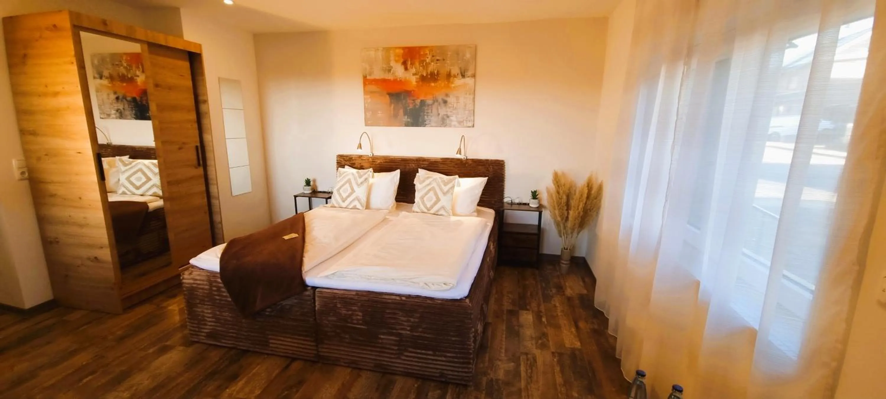 Bed in CJS Apartments - Chill or Drive am Nürburgring, new Box Spring Beds, new furniture, WLan, Spacious Rooms, Quiet Location