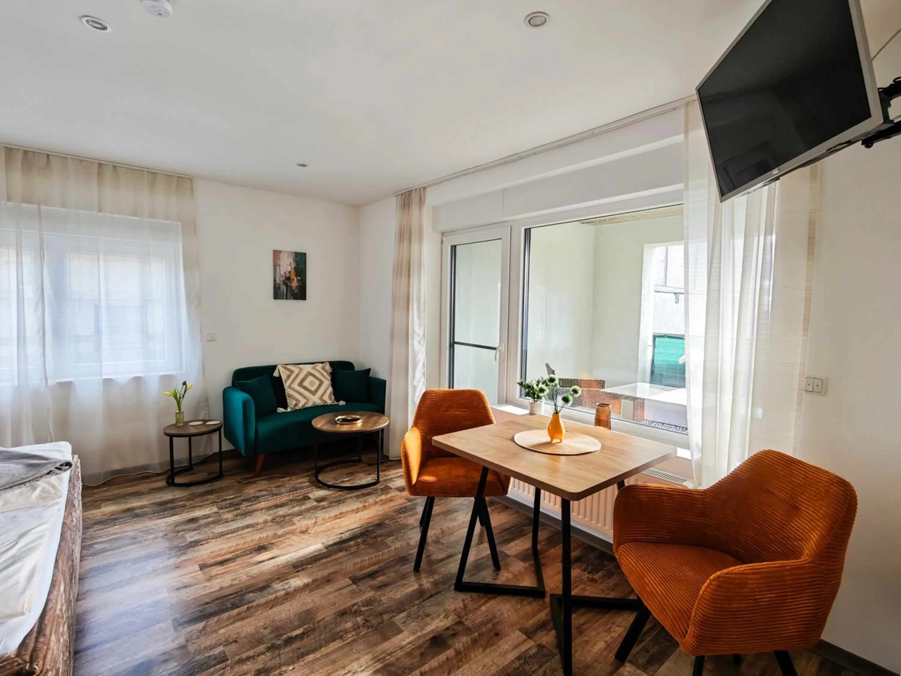 Photo of the whole room in CJS Apartments - Chill or Drive am Nürburgring, new Box Spring Beds, new furniture, WLan, Spacious Rooms, Quiet Location