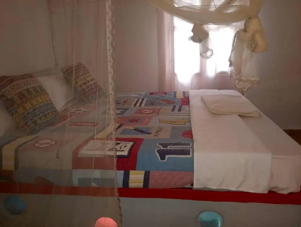 Bed in Richy Hotels and Safaris