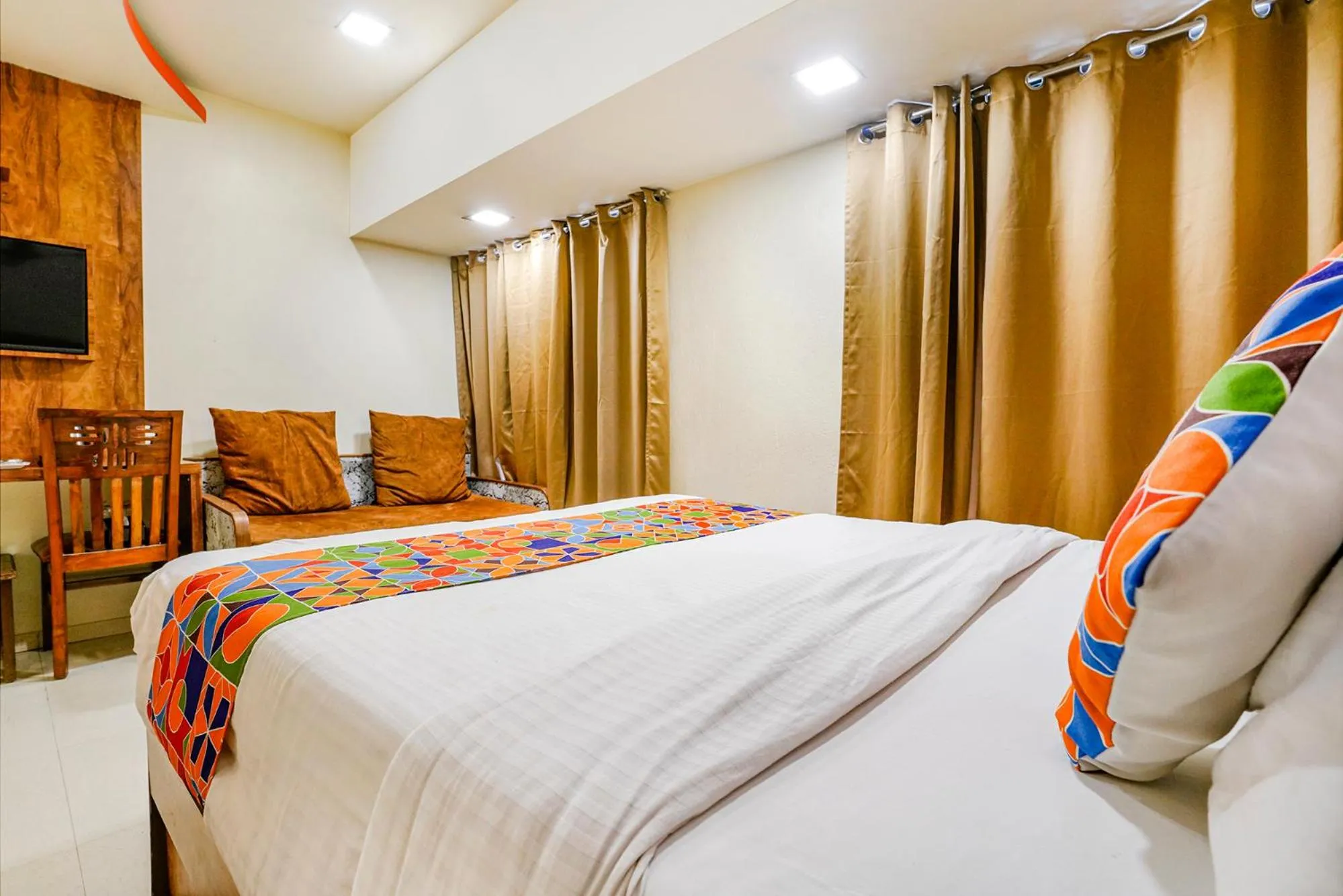 Bed in FabHotel Amber Corp Inn