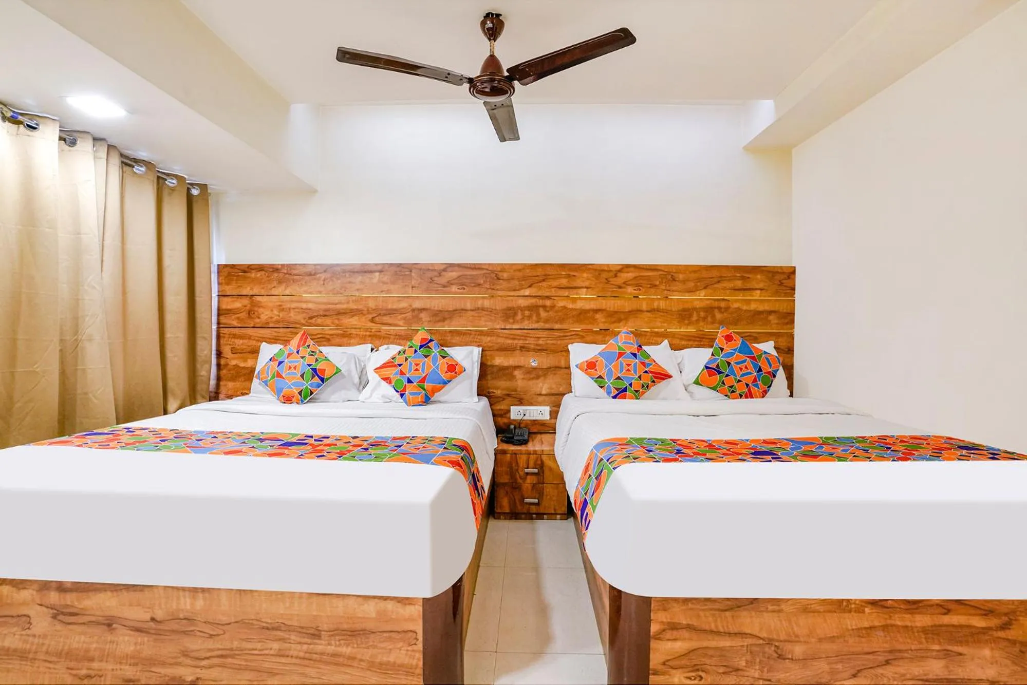 Bed in FabHotel Amber Corp Inn