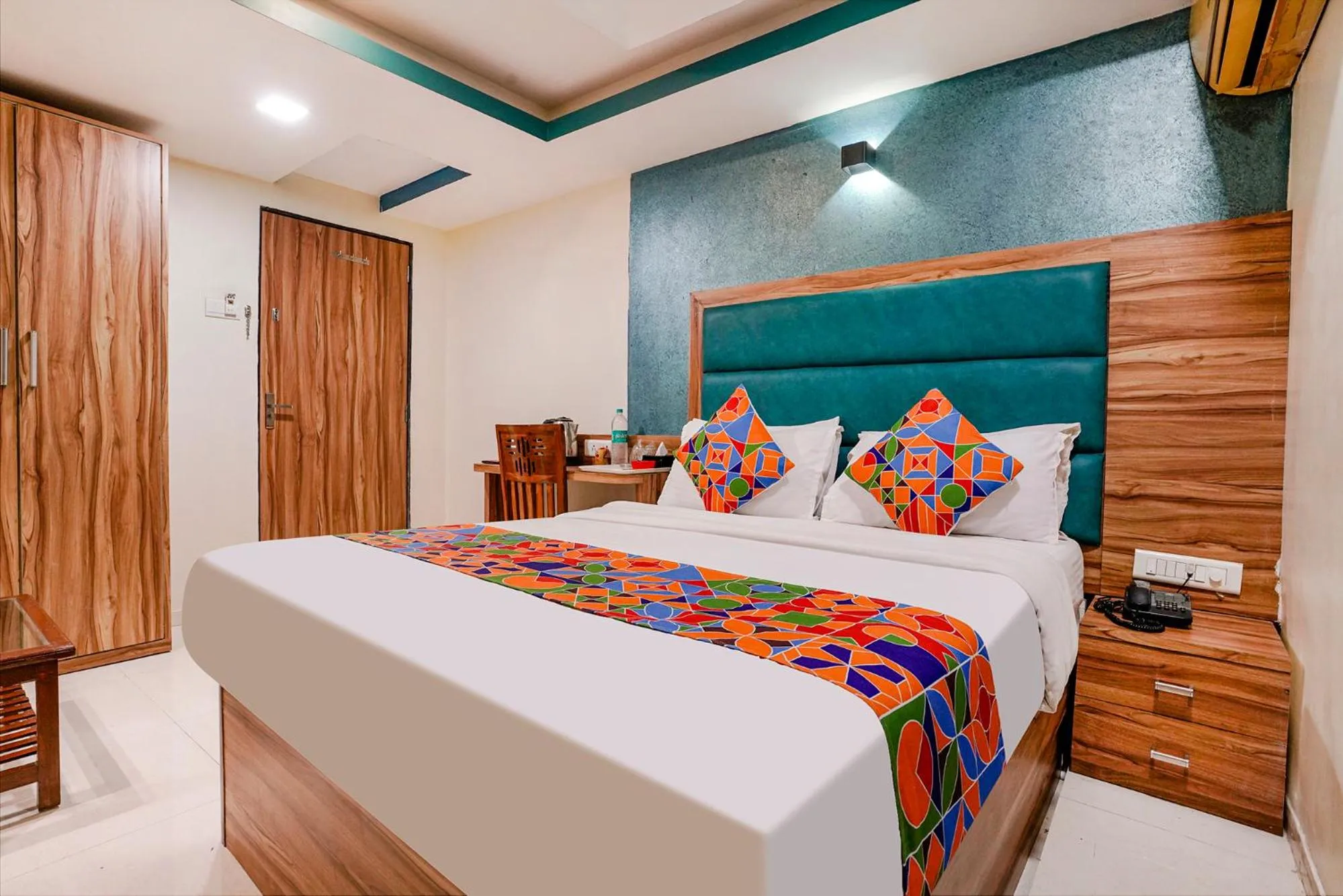 Bed in FabHotel Amber Corp Inn