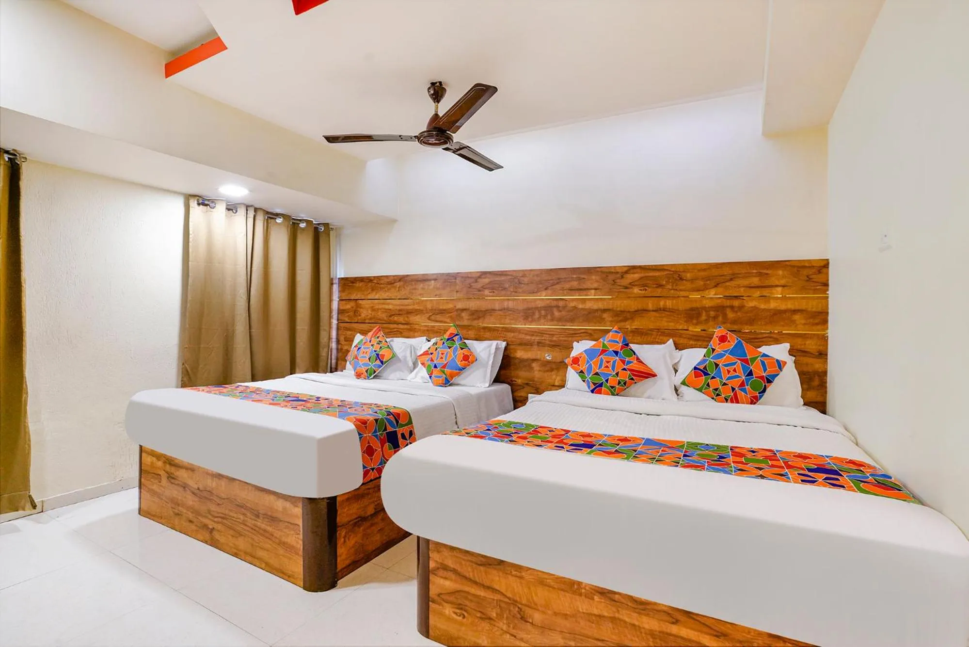 Bed in FabHotel Amber Corp Inn