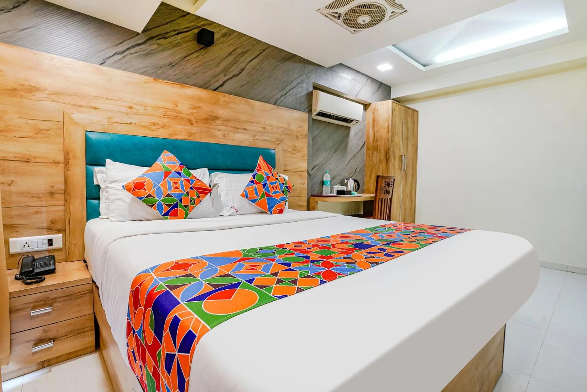 Bed in FabHotel Amber Corp Inn