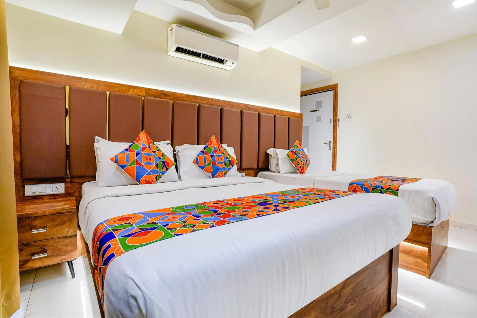 Bed in FabHotel Amber Corp Inn