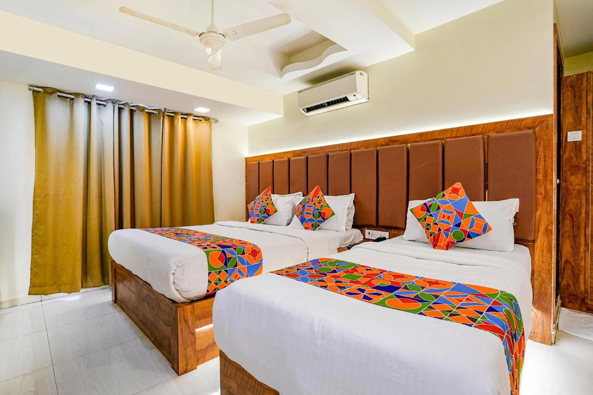 Bed in FabHotel Amber Corp Inn