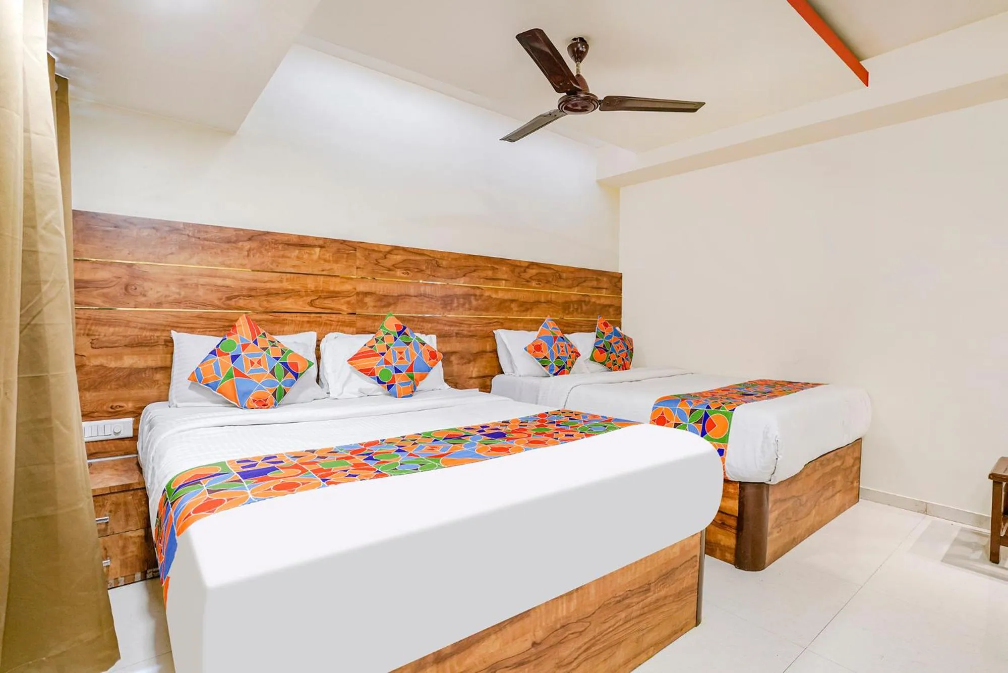 Bed in FabHotel Amber Corp Inn