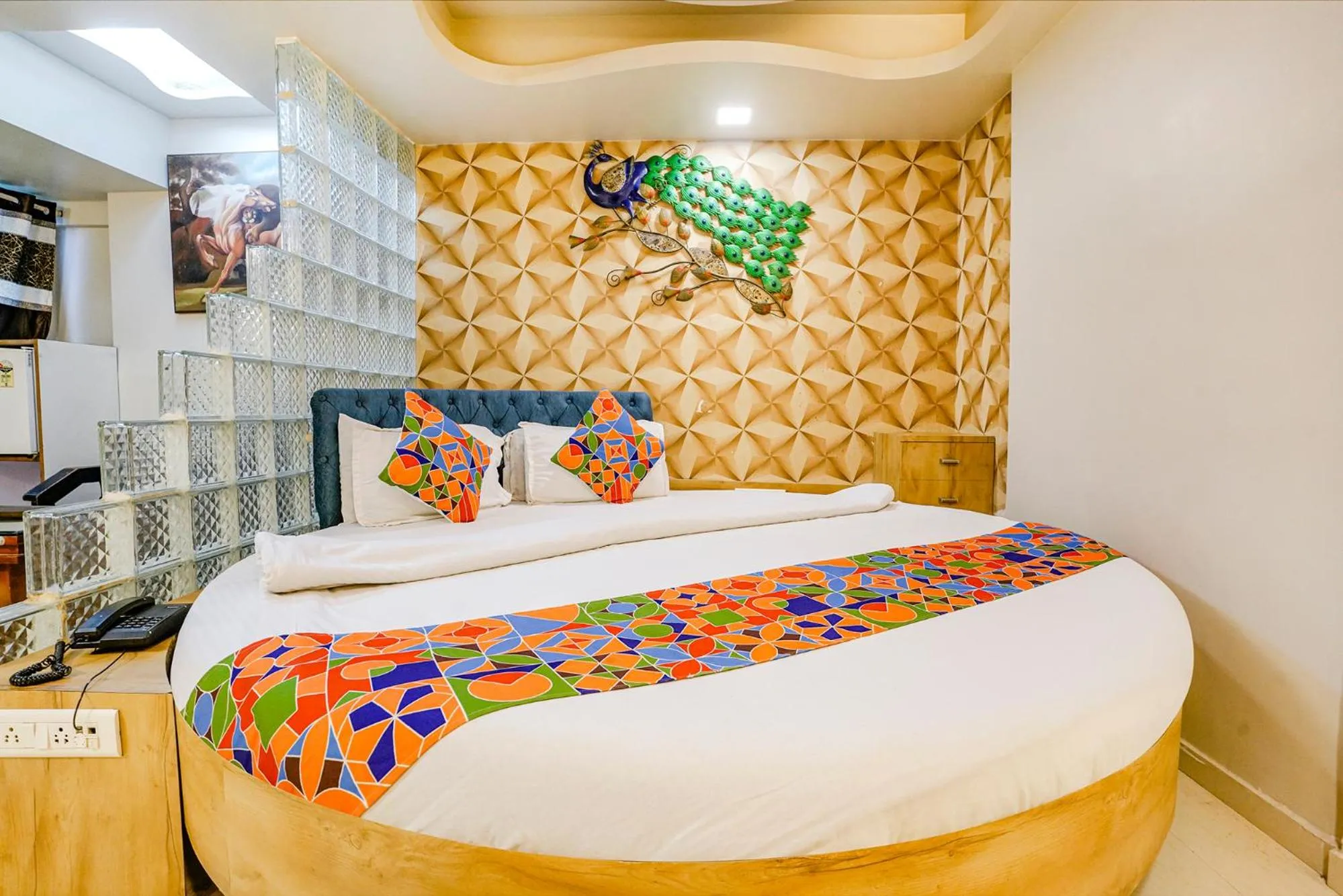 Bed in FabHotel Amber Corp Inn