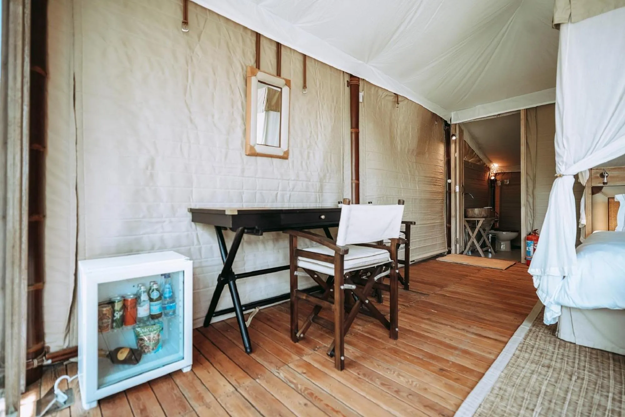 Seating area, Bed in Hiddenbay Teos Hotel